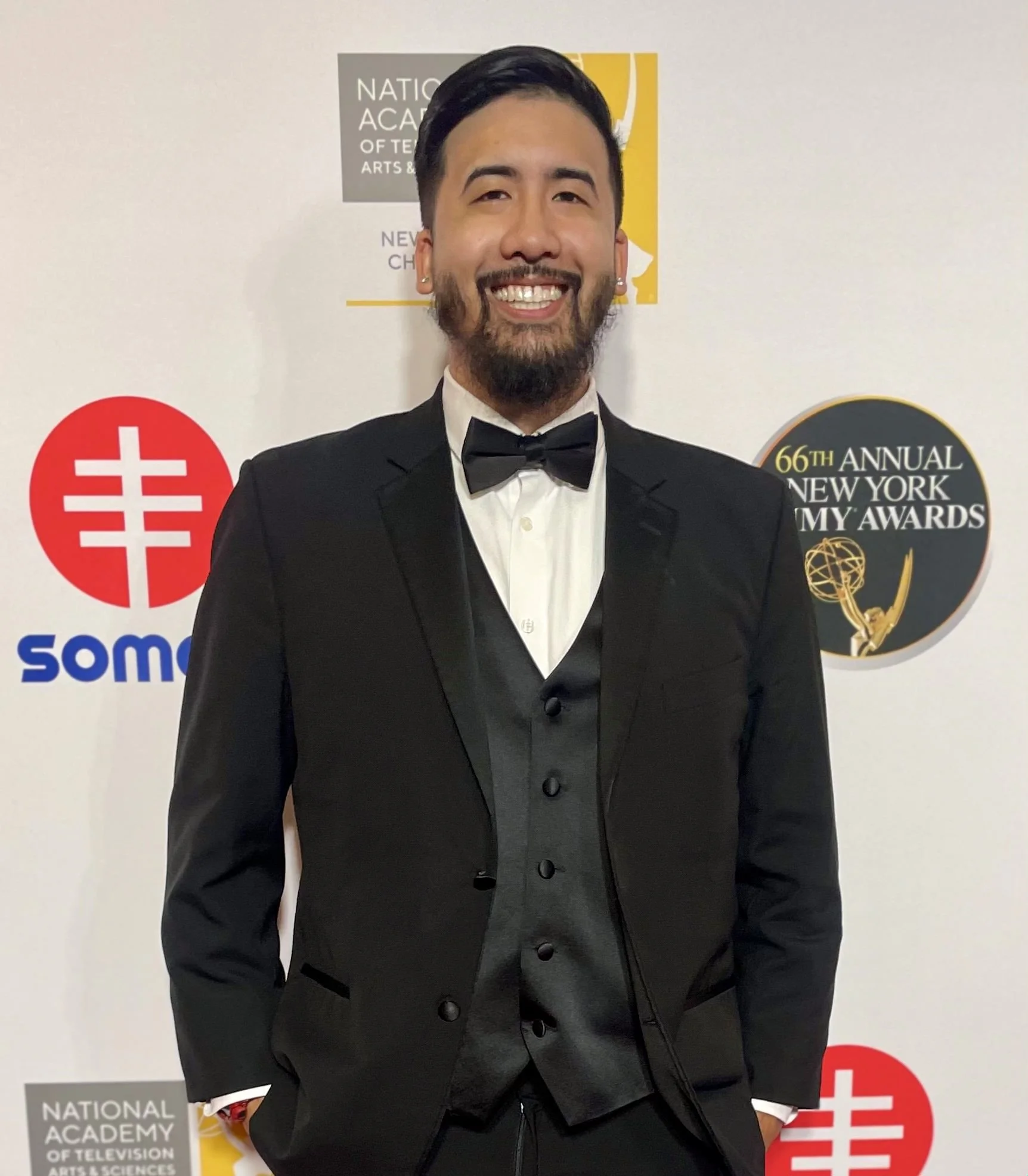 Keith Sunthorn. The background has logos including the National Academy of Television Arts & Sciences and a round emblem reading '66th Annual New York Emmy Awards' with a gold trophy graphic.