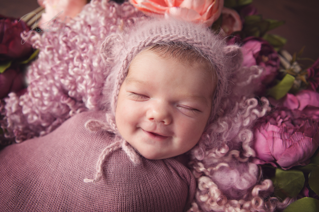 pink newborn with flowers
