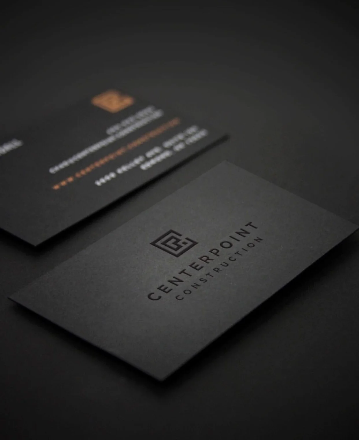  Business card in application to illustrate the black foiling and white ink execution of the cards themselves. Photo by Natalie Kent. 