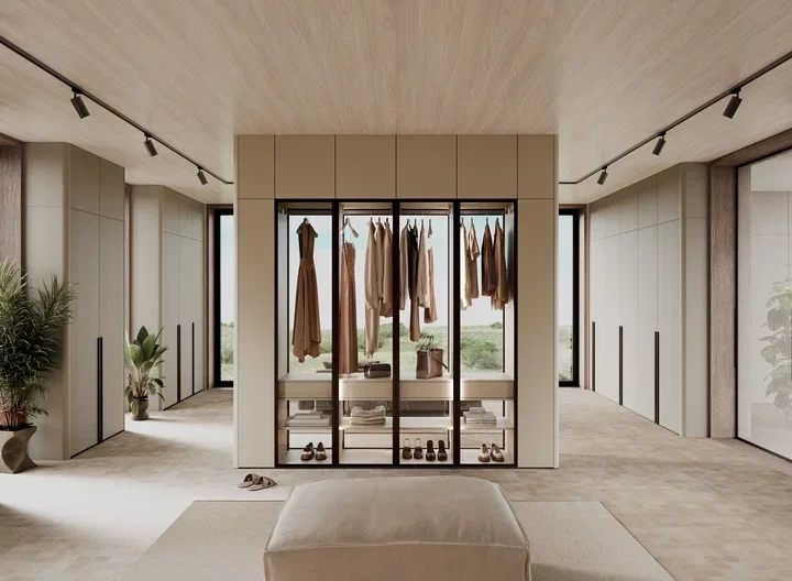 LEICHT dressing room with handleless cream wardrobe walls and a glass-front central unit