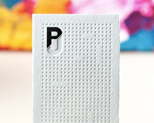 Embossing brings this business card to new heights.