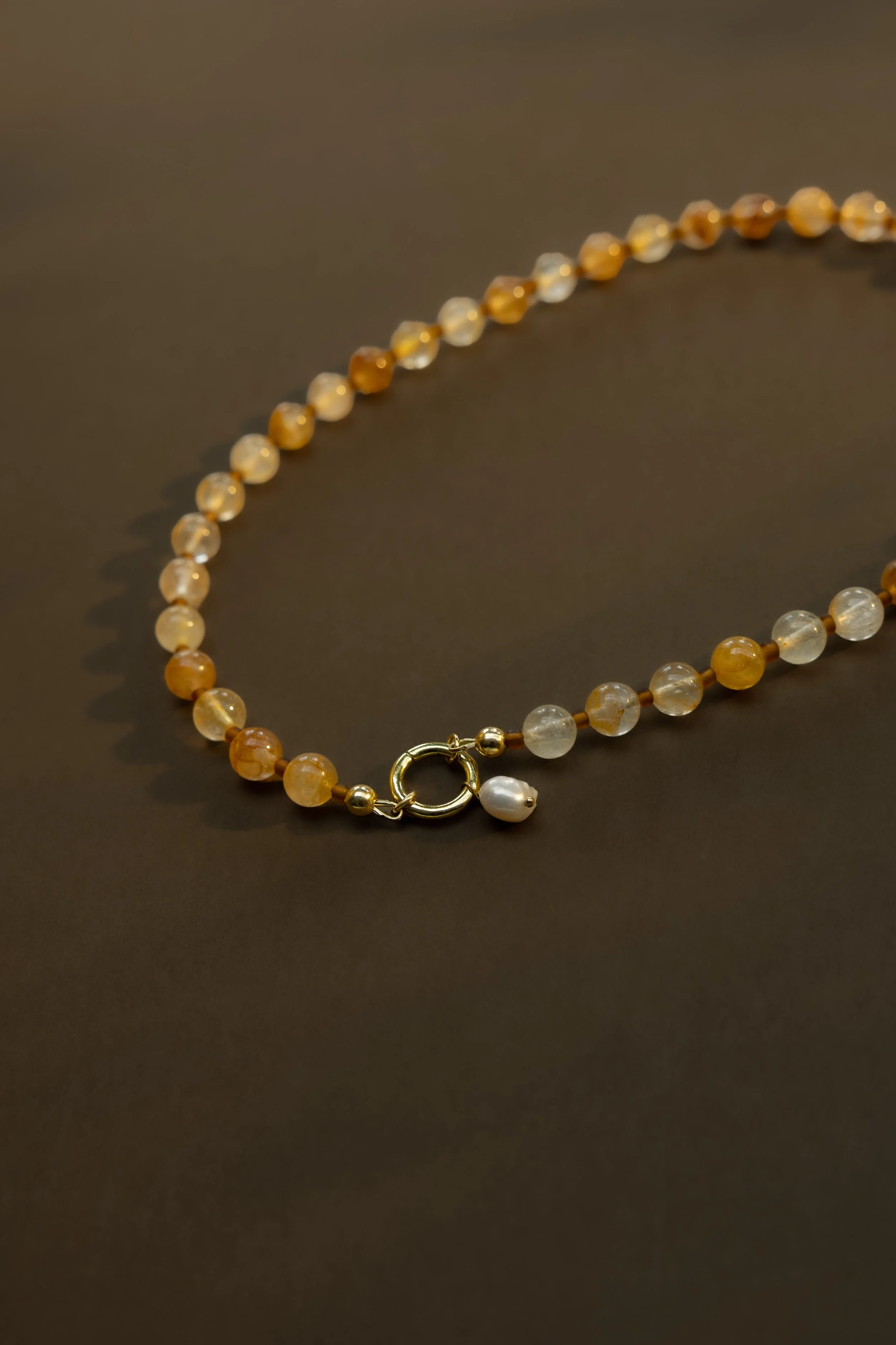 Clay &amp; Sunlight Collection. Handmade amber ceramic beads paired with citrine and pink sunstone gemstones. Finished with 14ct gold filled findings. Ochre Jewellery, handmade Byron Bay.
