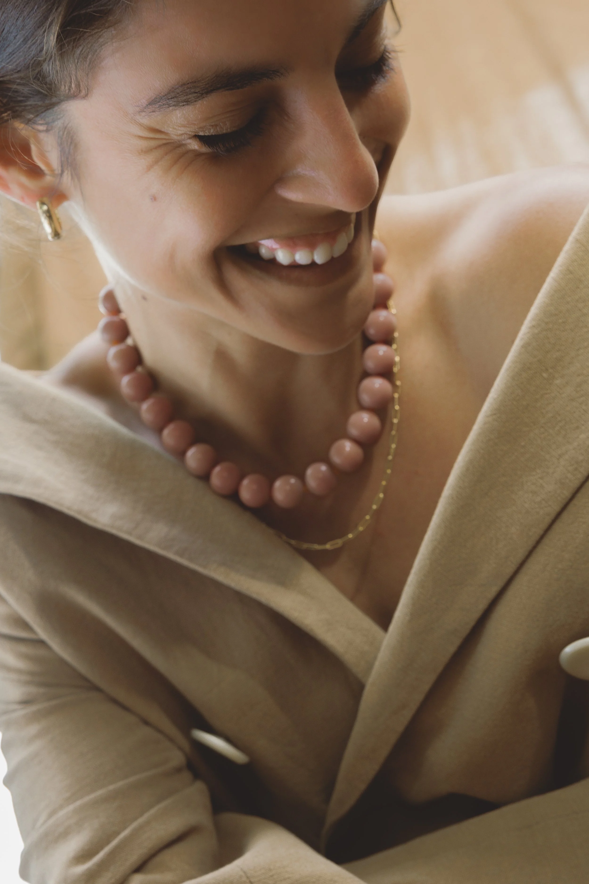 Sunstone Necklace. Large, glossy pink sunstone gemstone beads spaced with citrine. Finished with 14ct gold filled findings. Ochre Jewellery, handmade Byron Bay.