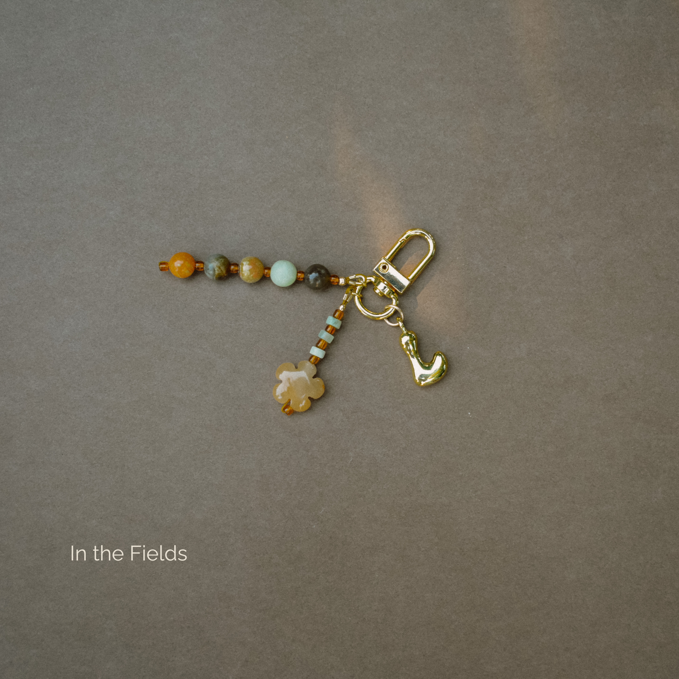 Ochre Key Chain, beaded & gold charm key, bag and belt chain. | Handmade Byron Bay.