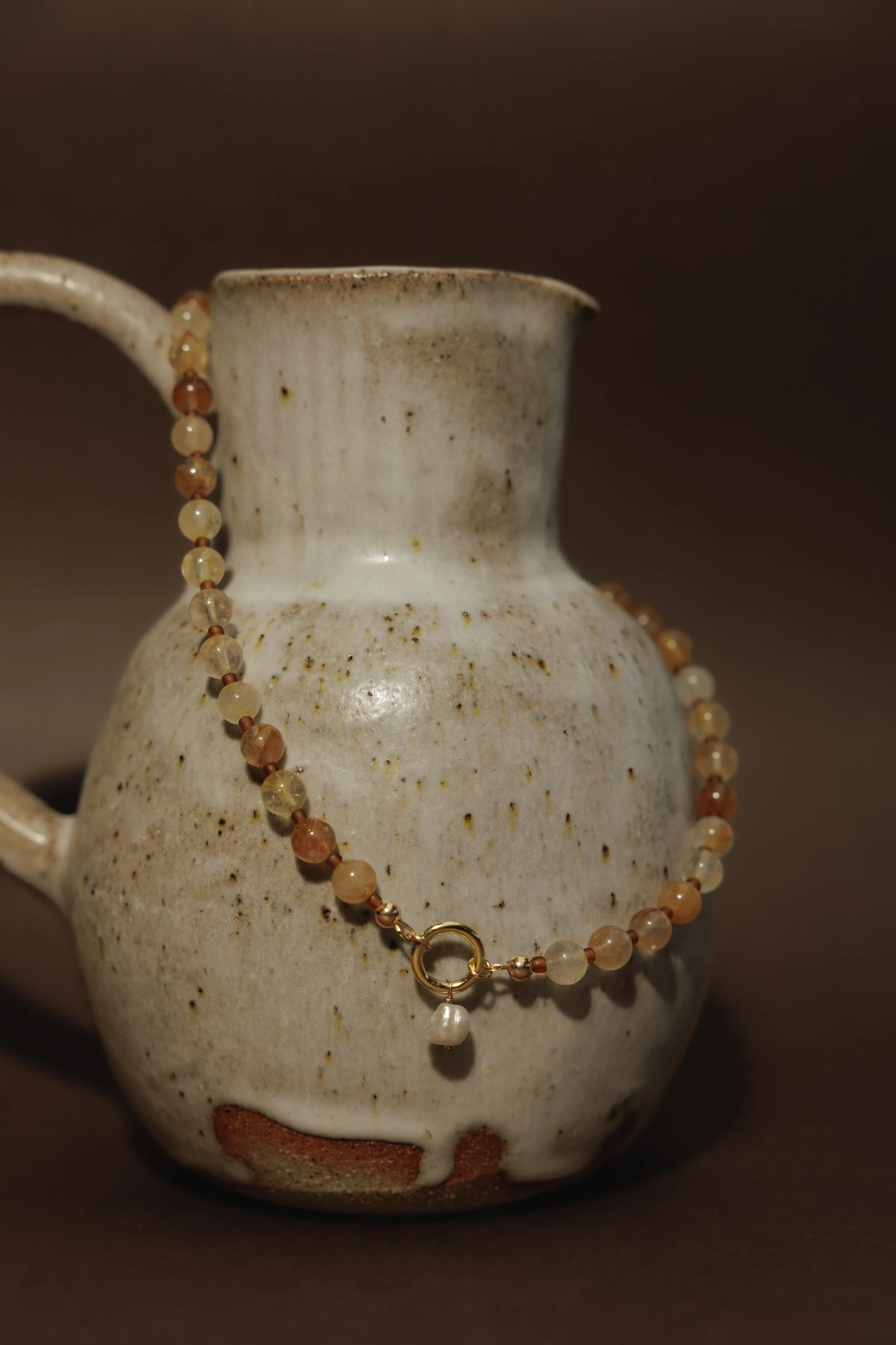 Citrine Necklace. Round faceted citrine gemstone beads with a personalised charm clasp. Finished with 14ct gold filled findings. Ochre Jewellery, handmade Byron Bay.