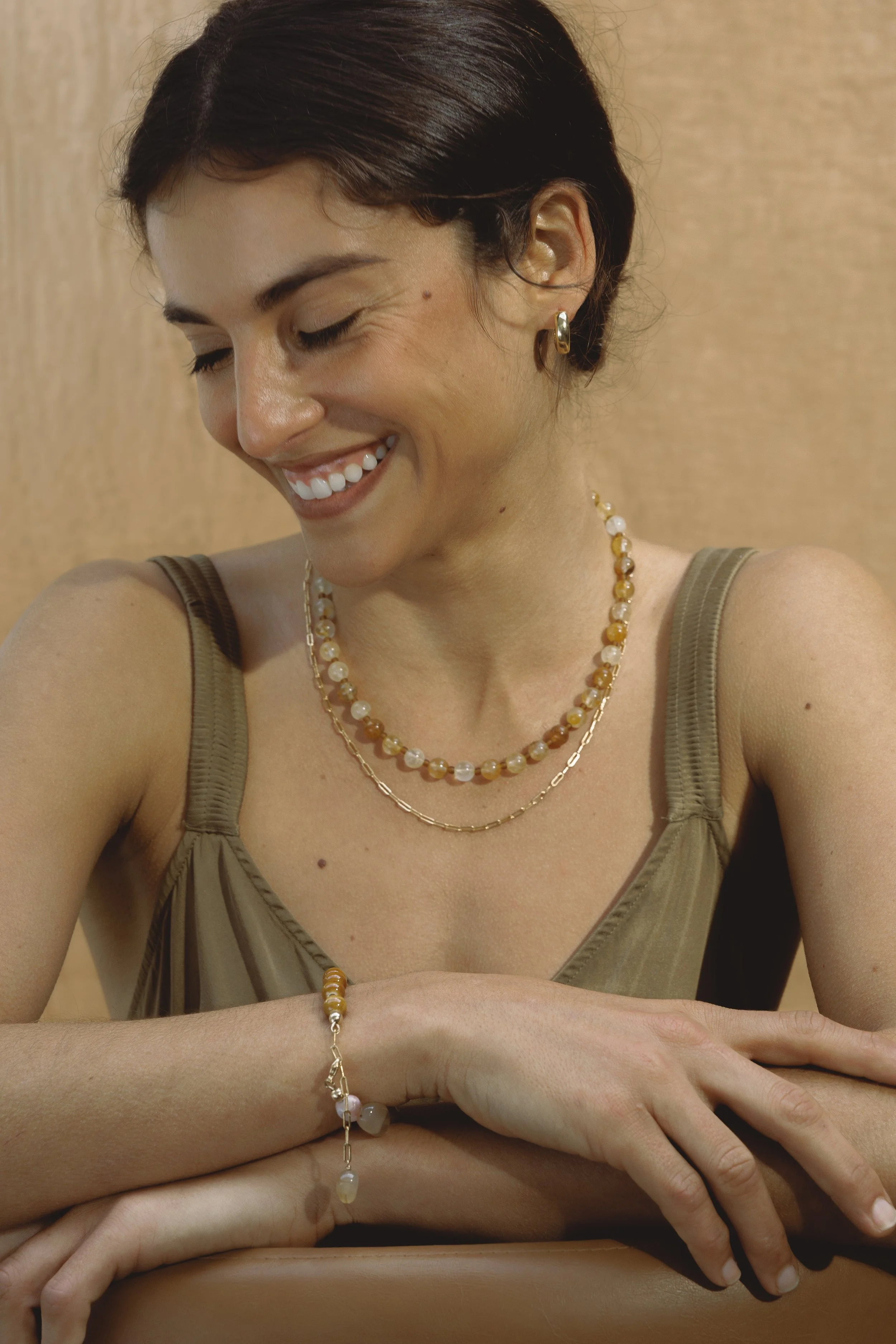 Citrine Necklace. Round faceted citrine gemstone beads with a personalised charm clasp. Finished with 14ct gold filled findings. Ochre Jewellery, handmade Byron Bay.