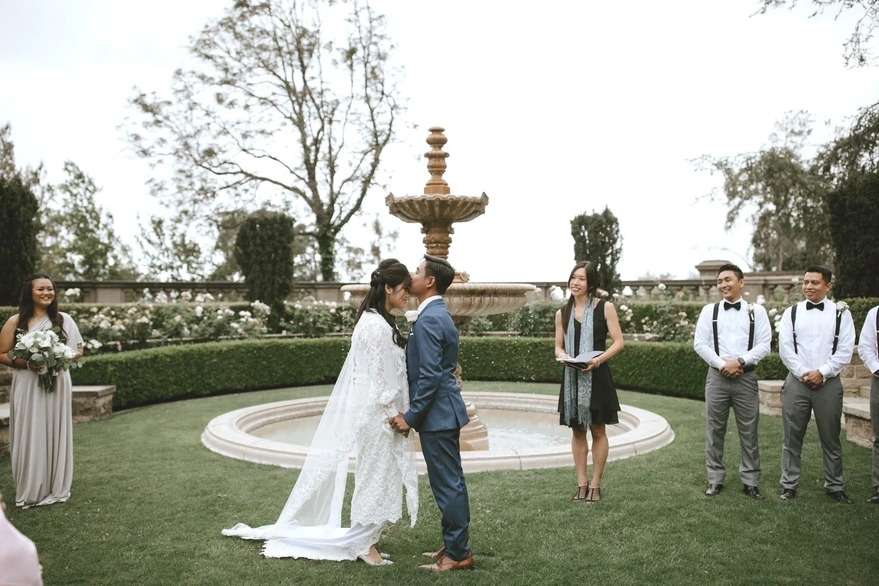 Couple getting married at Greystone Mansion, Los Angeles, with Officiant Candice from 1 Hour Marriage officiating a beautiful outdoor wedding.