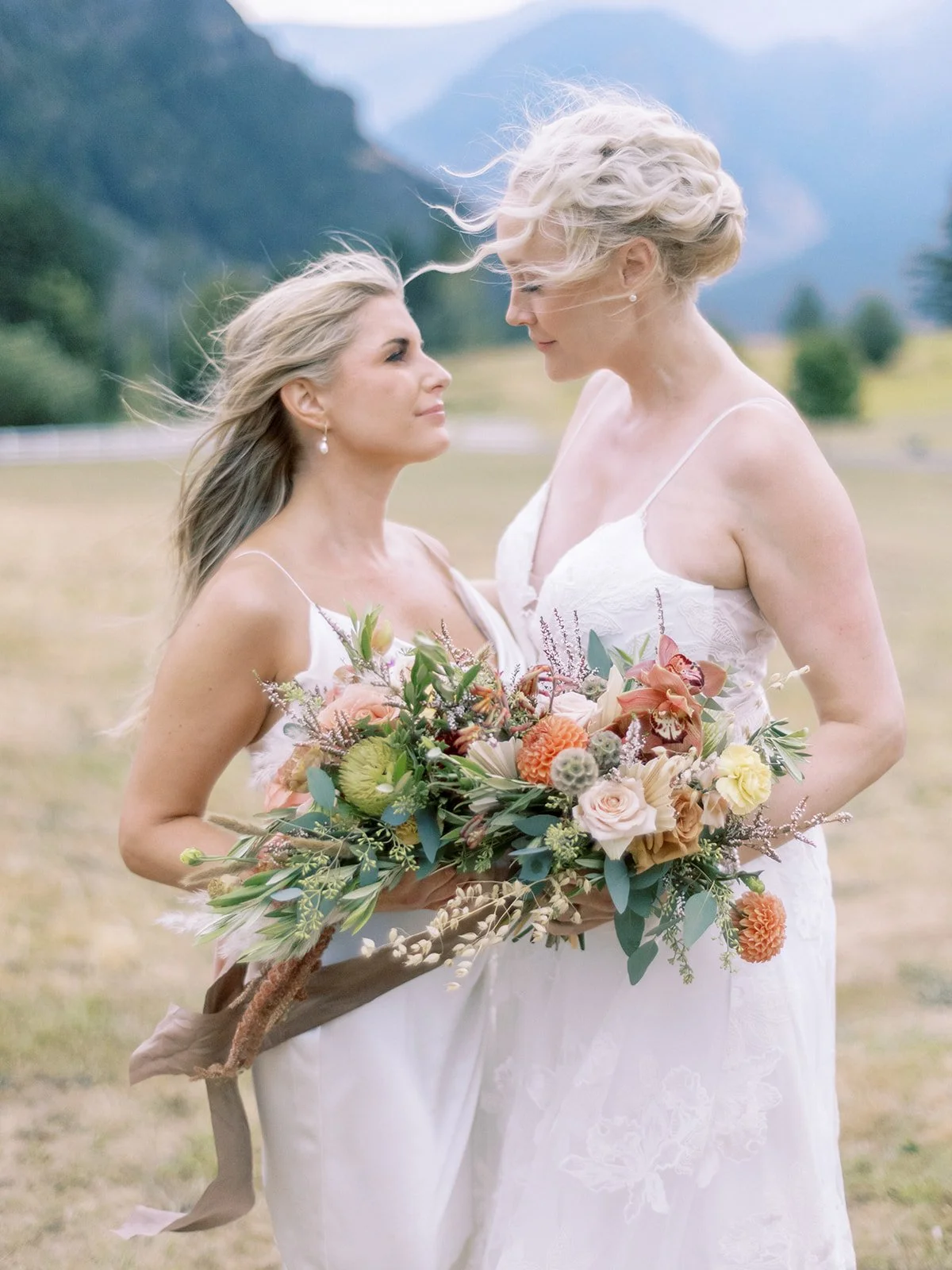 Photo of two brides from Lake Minnetonka on their wedding day