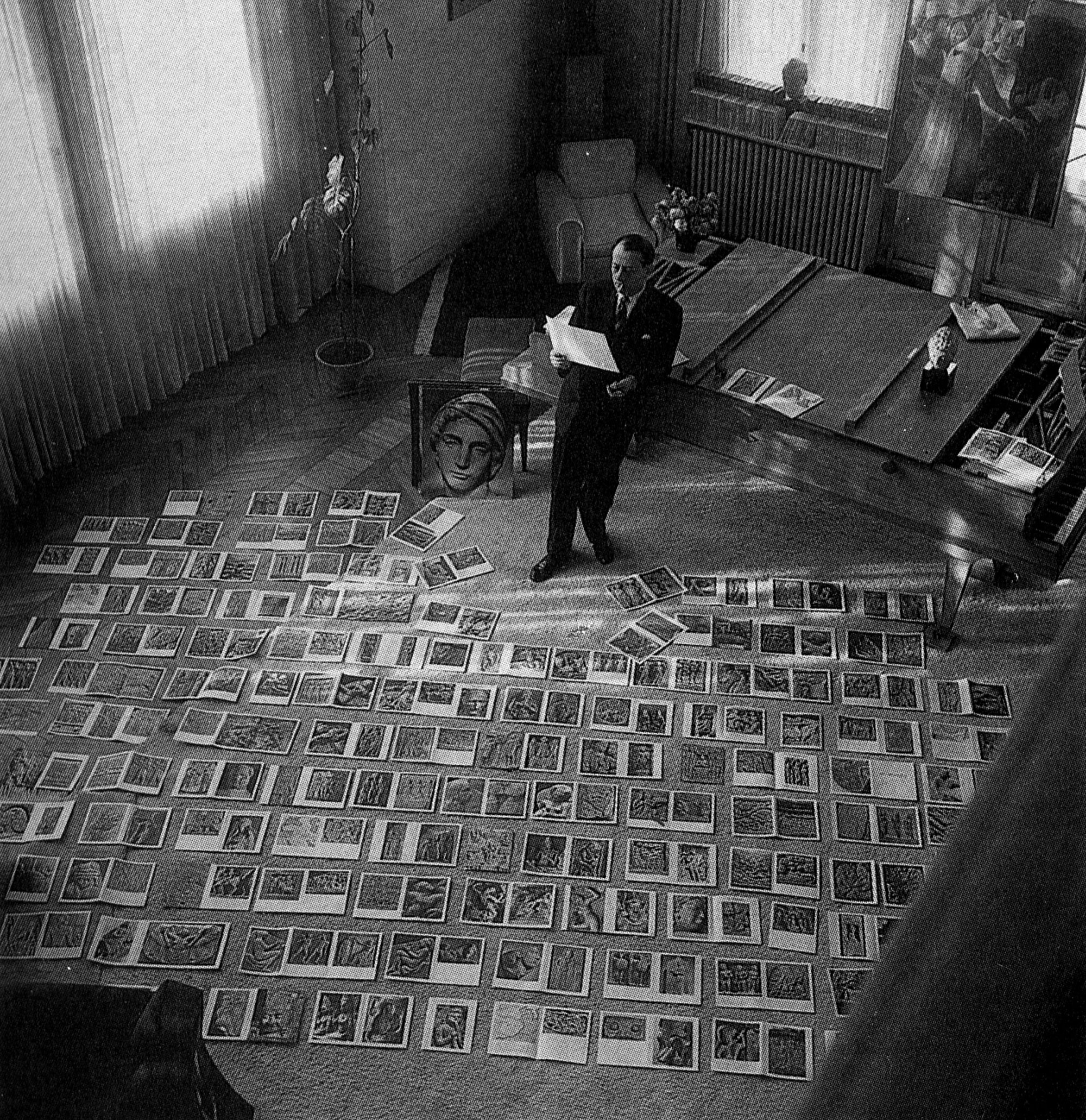  André Malraux while working on his book  Lemusée imaginaire de la sculpture mondiale , based on the premise of the  musée imaginaire , or the imaginary museum, 1954. 
