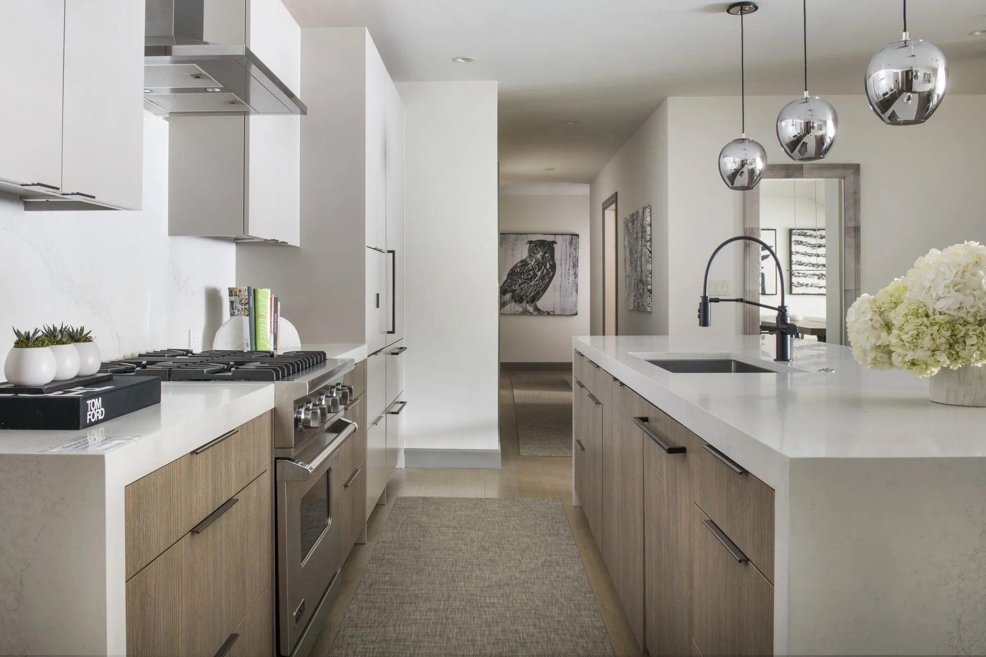 Kitchen with white furnishing and spacious cabinet