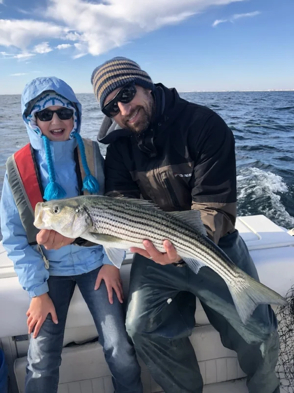 Dave Werner, fisherman, biology teacher and regular customer and his daughter, Amalie. Photo courtesy of Werner.