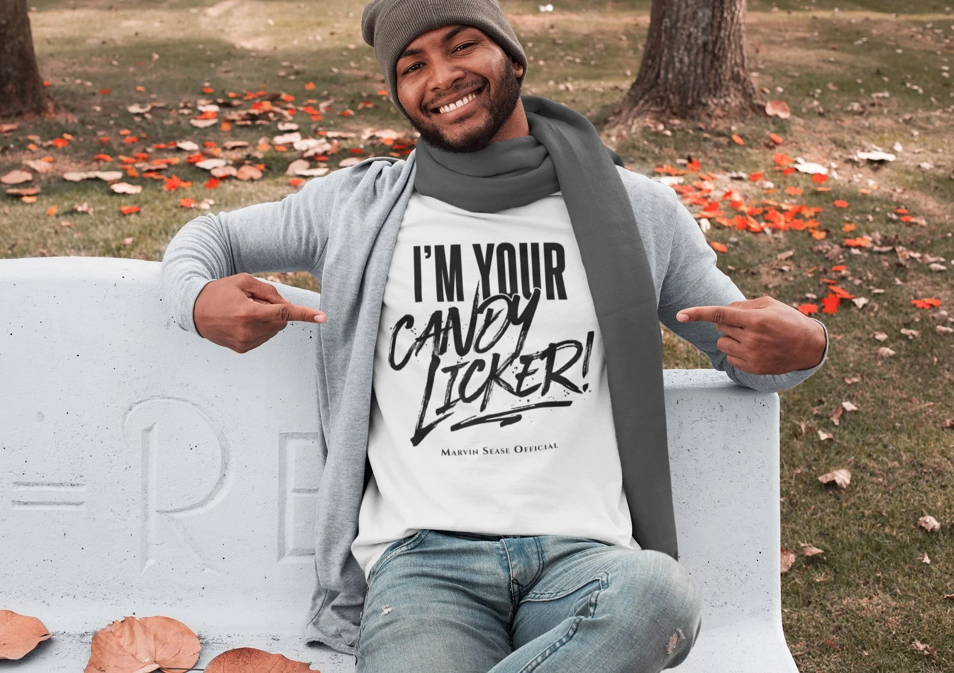 t-shirt-mockup-featuring-a-man-sitting-on-a-concrete-bench-at-a-park-in-autumn-30284.jpg