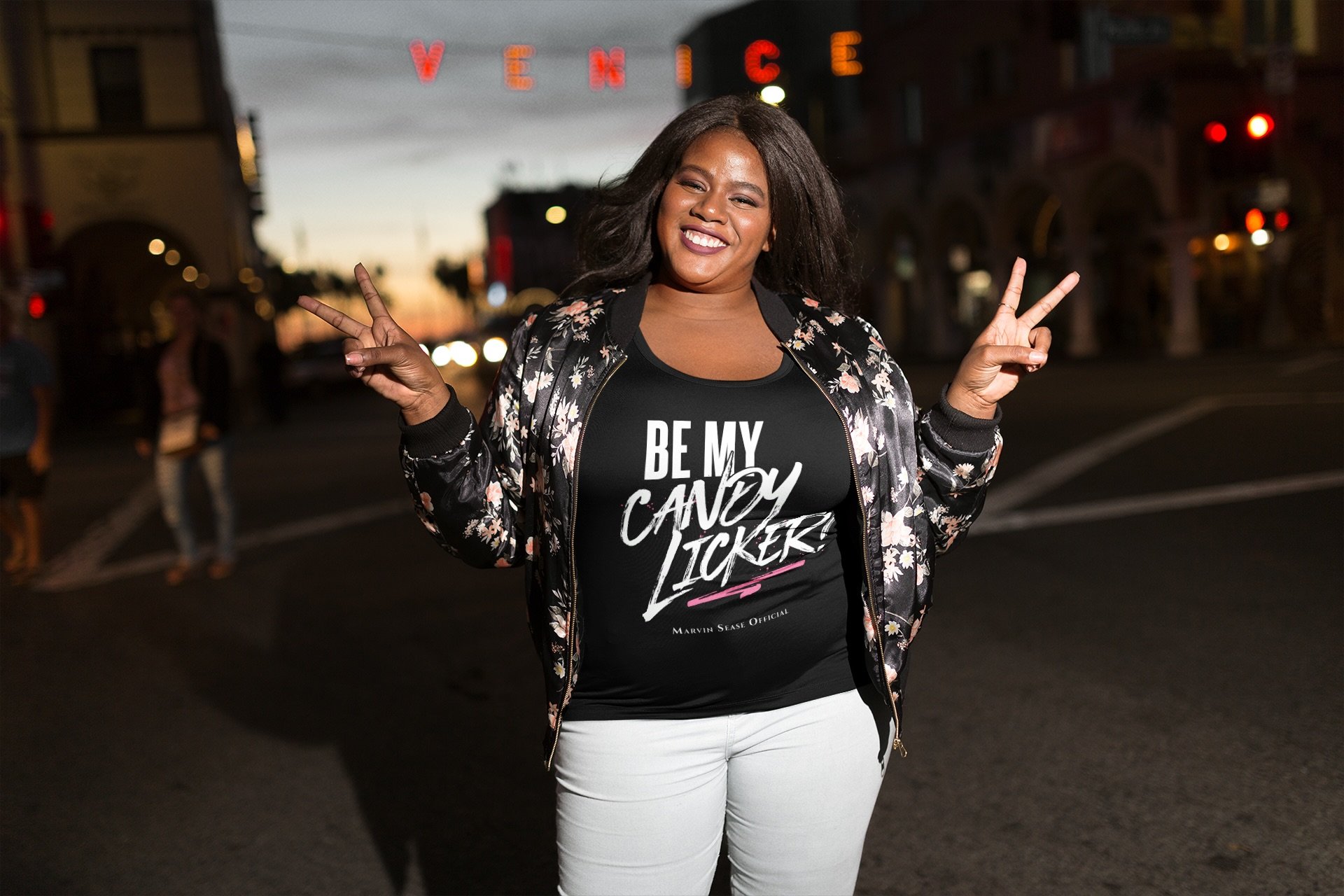 woman-wearing-a-plus-size-t-shirt-mockup-near-a-venice-sign-a18305.jpg