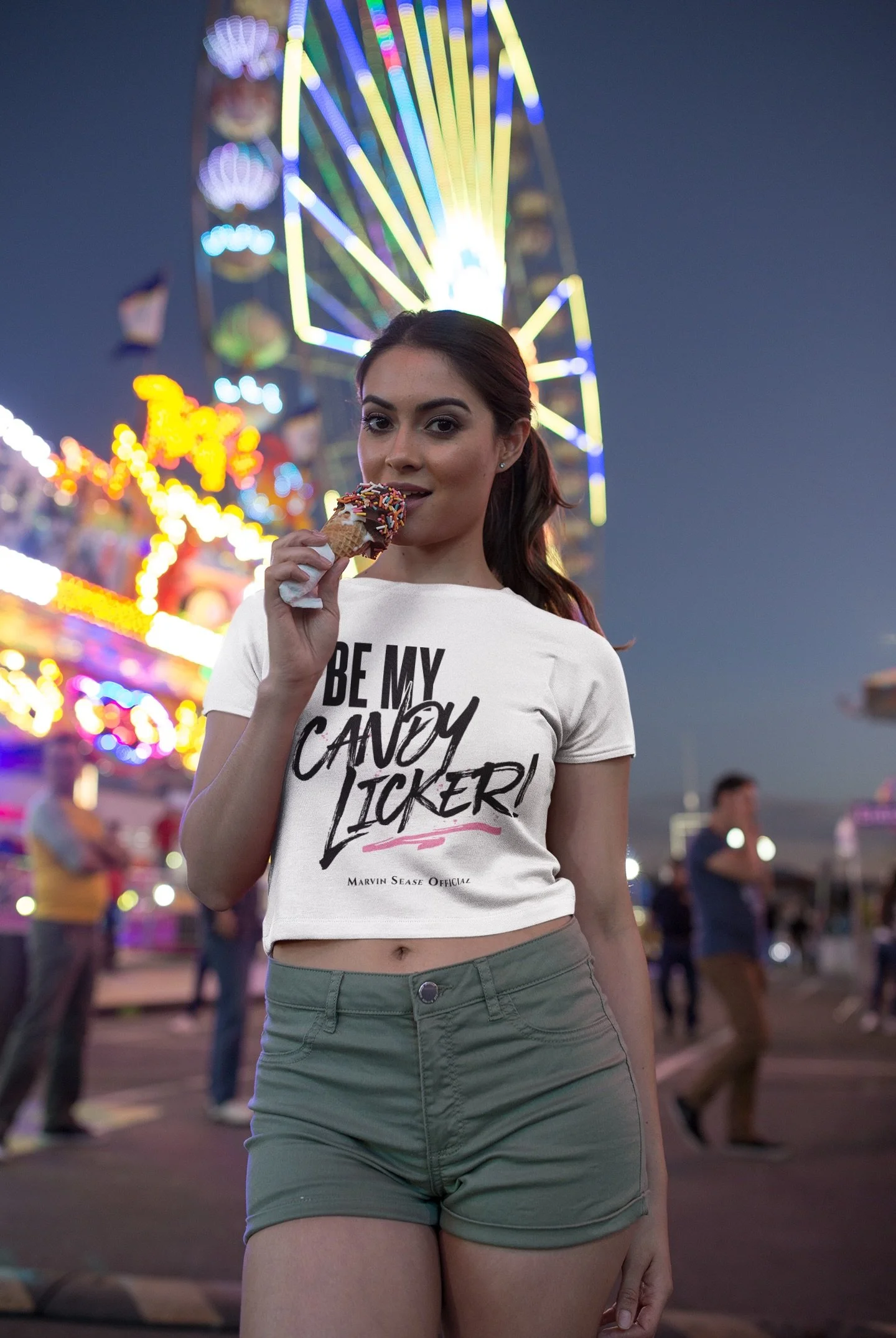 girl-wearing-a-t-shirt-mockup-having-an-ice-at-an-amusement-park-a19444.jpeg