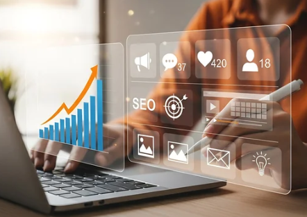 Person using a laptop with transparent digital icons displaying growth graph, SEO, social media, analytics, and communication symbols
