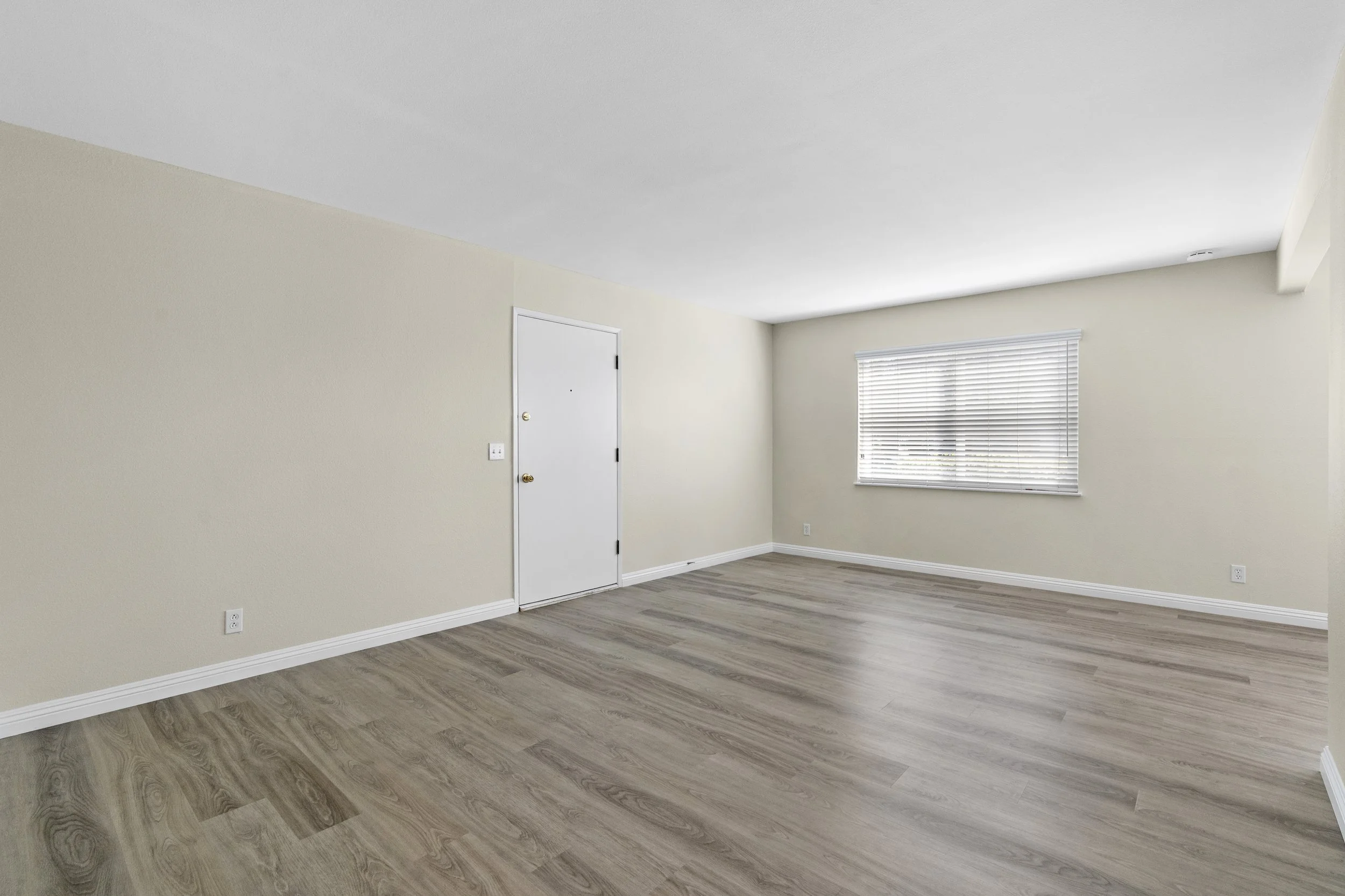 Real estate photography, virtual staging family room before