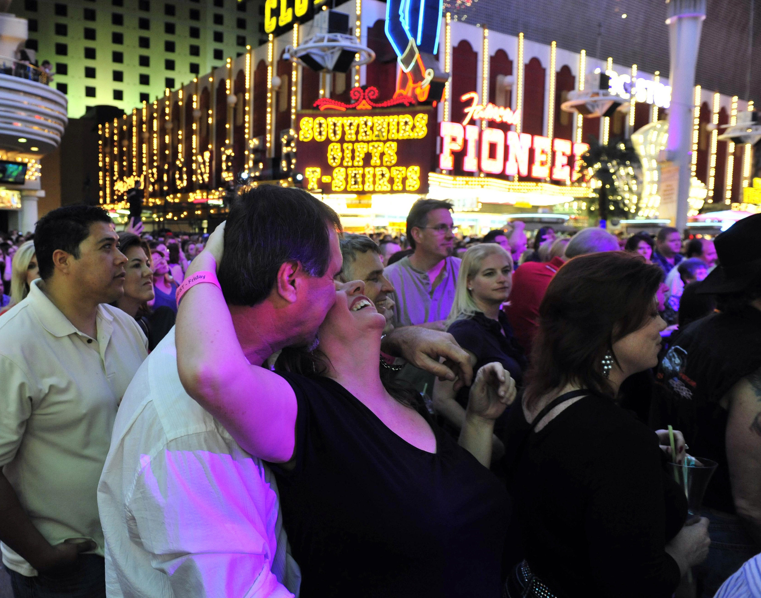  A couple dances and kisses while watching Scotty McCreery perform during ACM week March 30, 2012 in Las Vegas, Nev.  