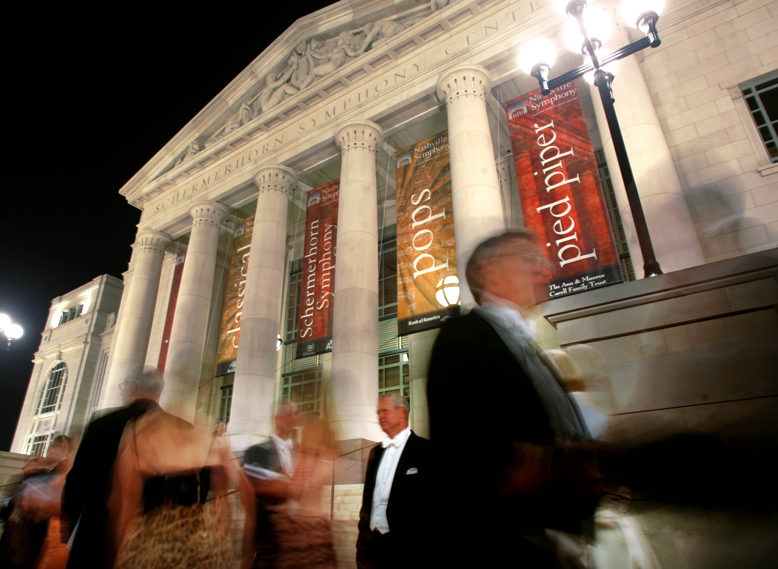  Symphony-goers stand outside the Symphony Center in the evening during the black-tie opening gala Saturday, September 9, 2006 in Nashville, Tenn.  