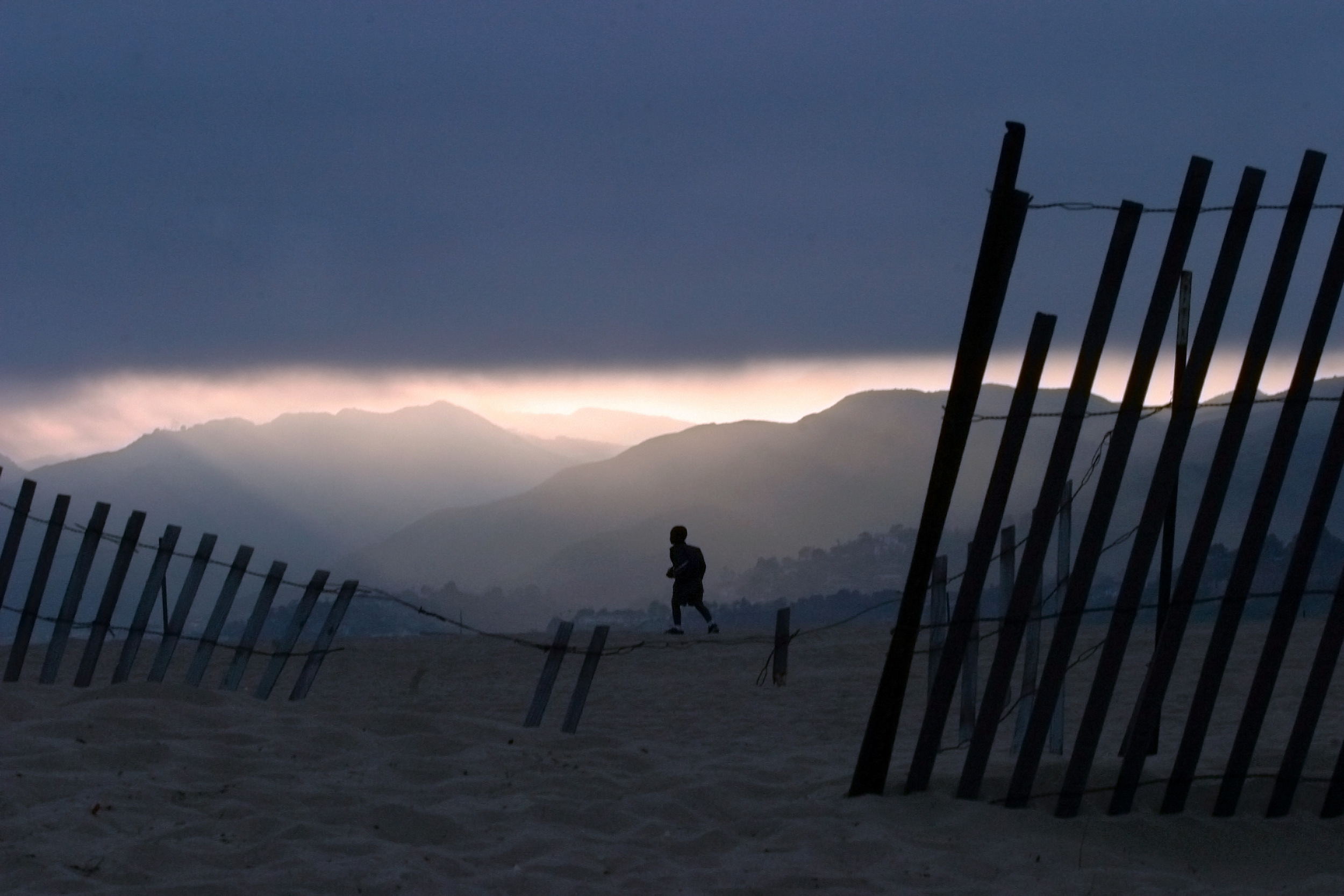  Darrius Young, 5, of Los Angeles walks along the beach in Santa Monica. Route 66 ends at the Santa Monica Pier and the Pacific ocean in California.  