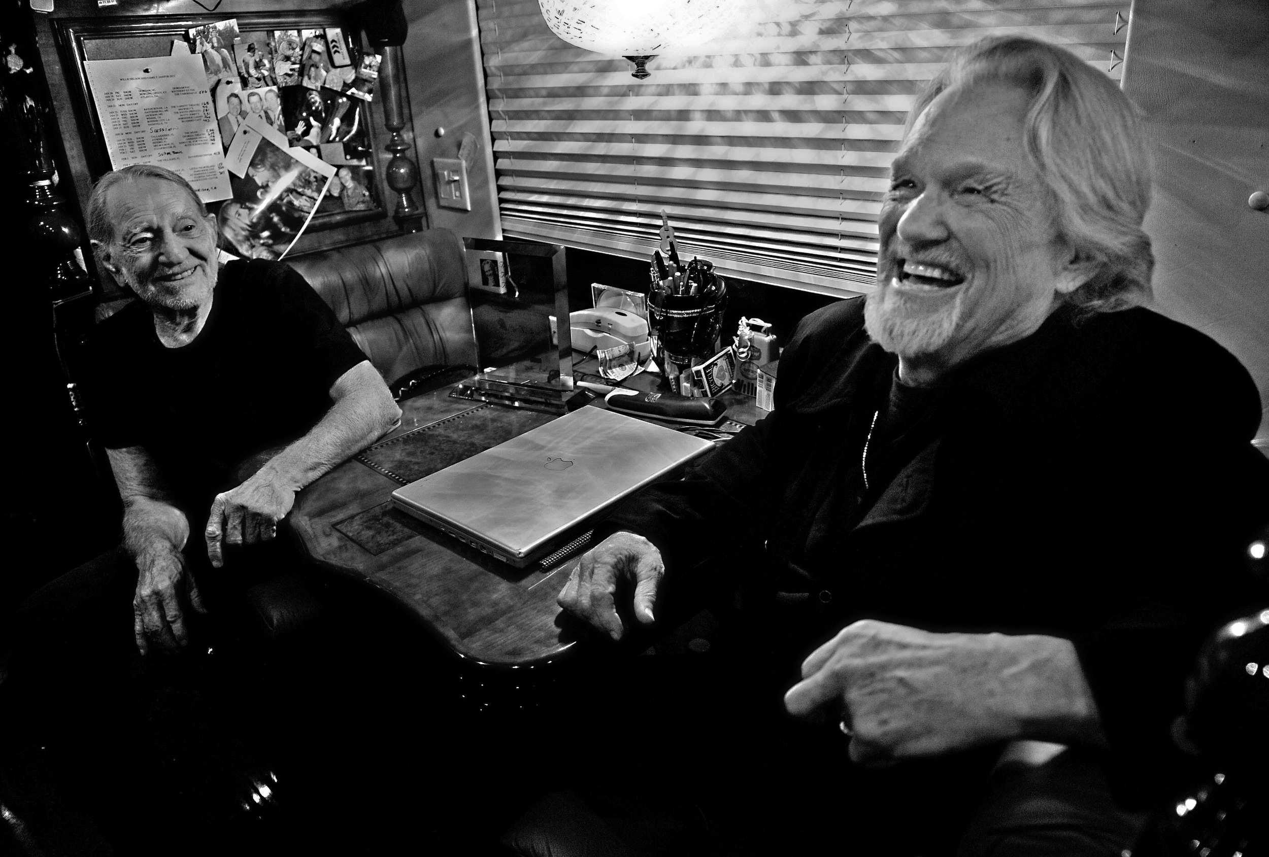  Willie Nelson and Kris Kristofferson share a joke together on the tour bus after performing at the Bluebird Cafe in Nashville, Tenn. 