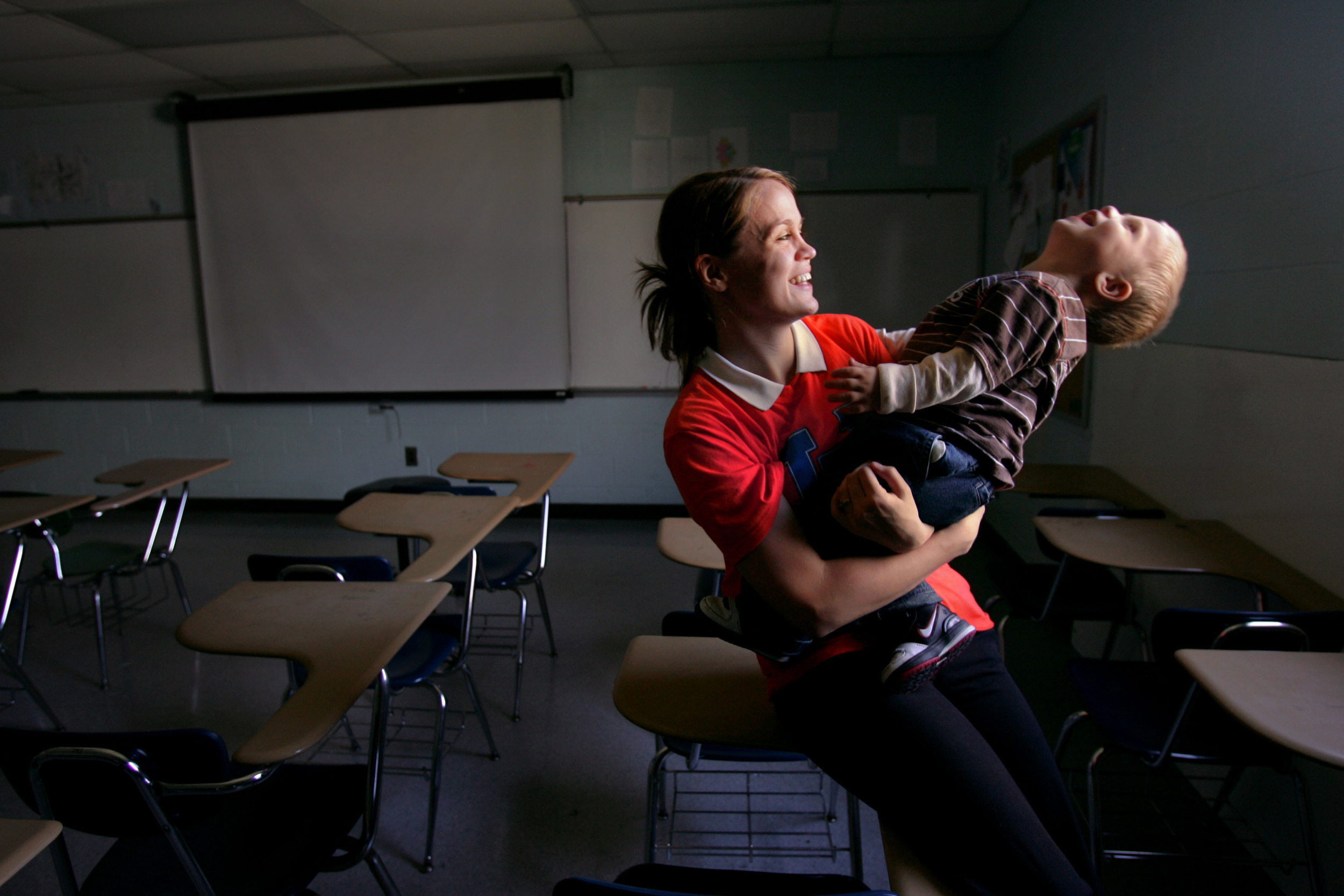  Graduating senior Amelia Koon with her son Christopher, 1, at Hunters Lane High School in Nashville, Tenn. Koon doubled up her coursework after missing a year and hopes to go to college. 