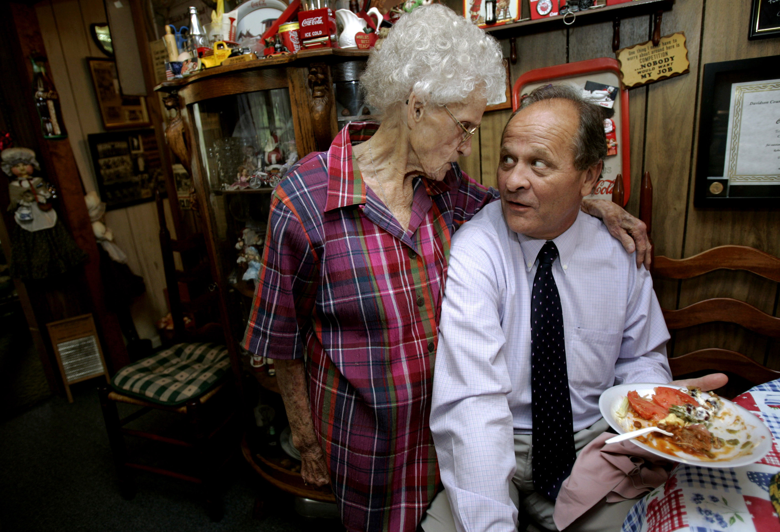  Martha "Mama" Tune jokingly gives her former high school student Judge Randy Kennedy a stern look at her election day luncheon, an election tradition for politicos since 1988, Thursday, August 7, 2008 in Hermitage, Tenn. 