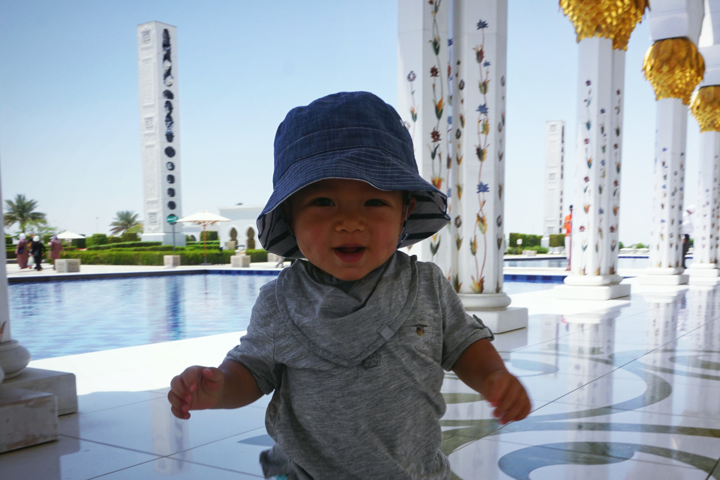 UAE_Abu Dhabi_Sheikh Zayed Mosque_baby toddler walking.jpg