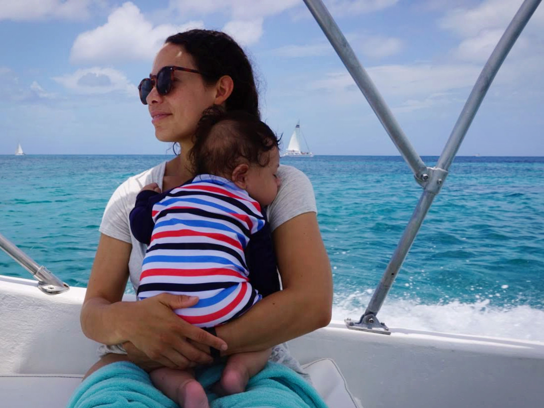 Orlo (4 months old) taking a nap on our boat ride off of Cozumel, Mexico