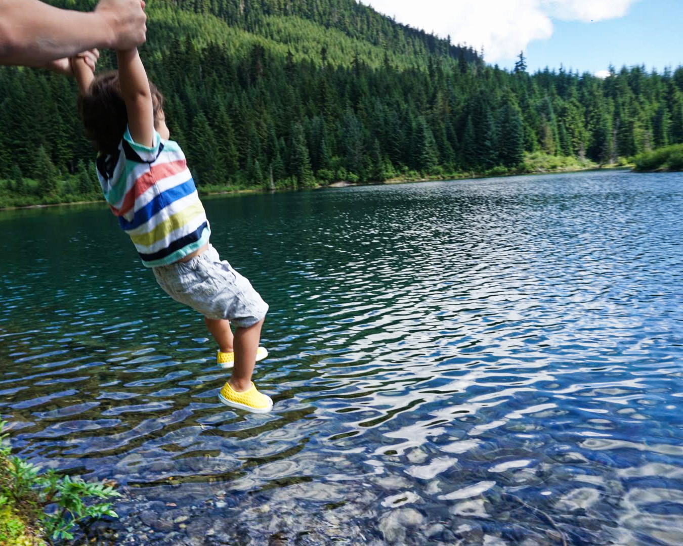 Elden (2 years old) swinging into the pond