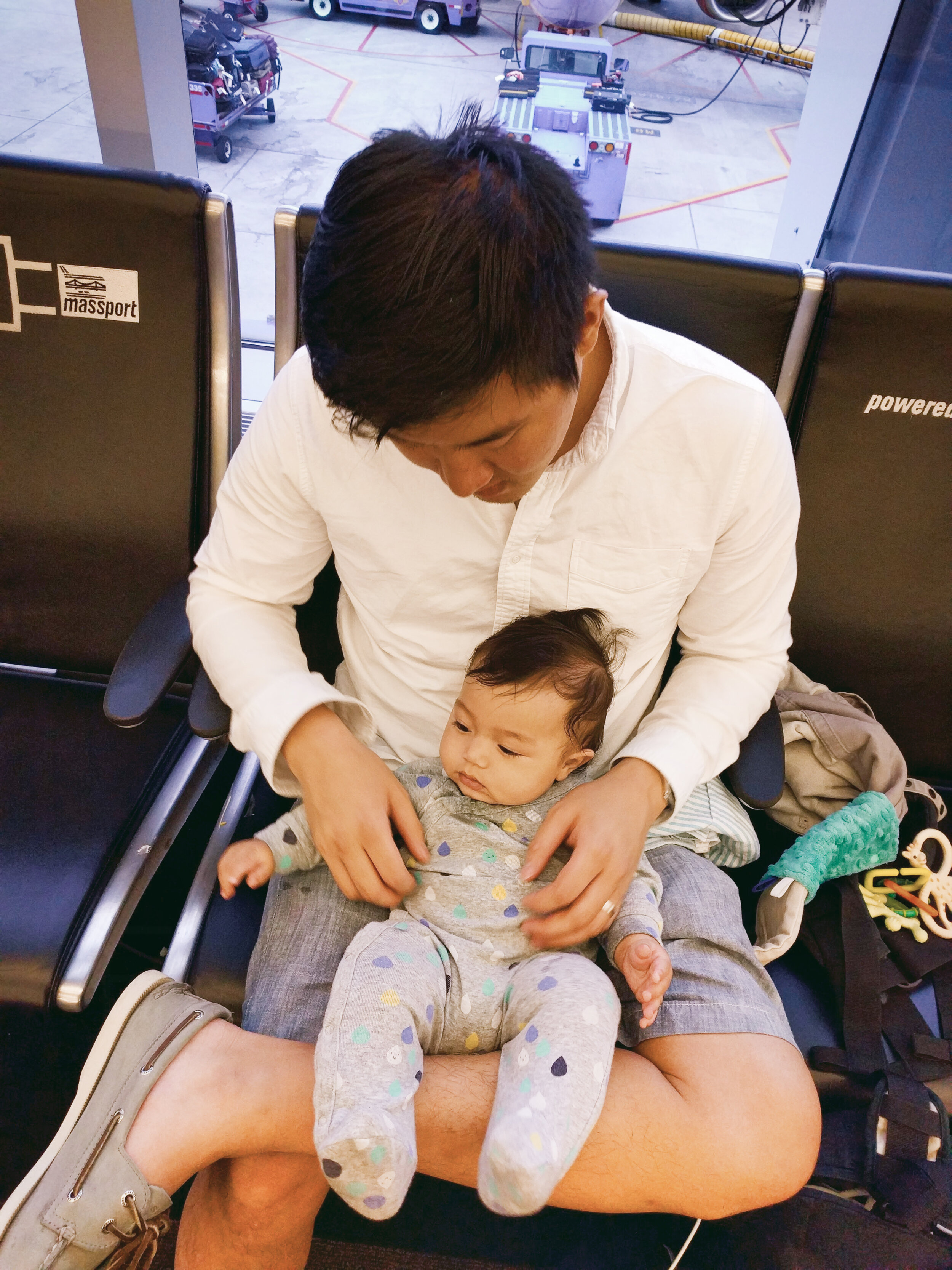  Steve and Elden (5 months old) waiting to board a flight out of BOS 