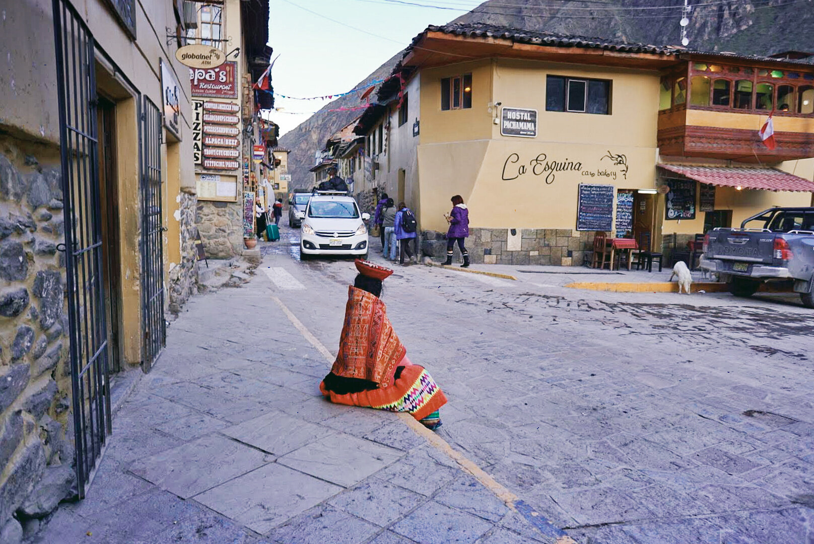 Narrow road that leads to main square in Ollantaytambo