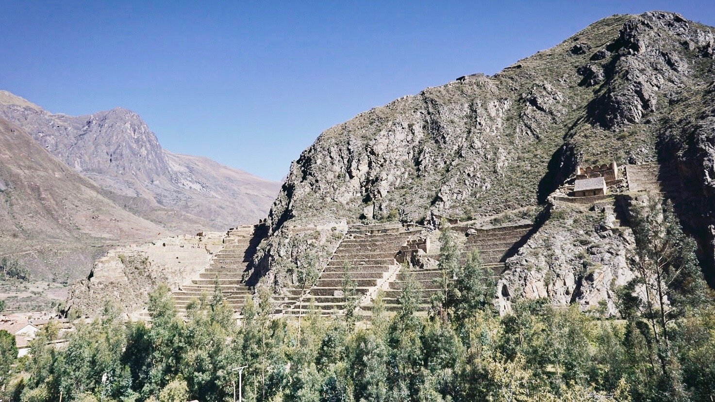 Ollantaytambo Archaeological Park Sanctuary ruins view from the Intitambo Hotel rooftop deck