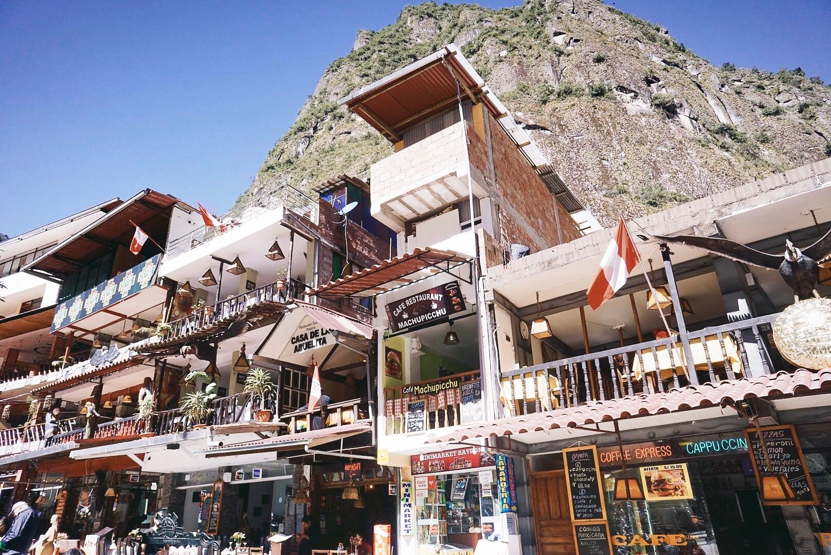 Shops, restaurants and hostels in Aguas Calientes main plaza 