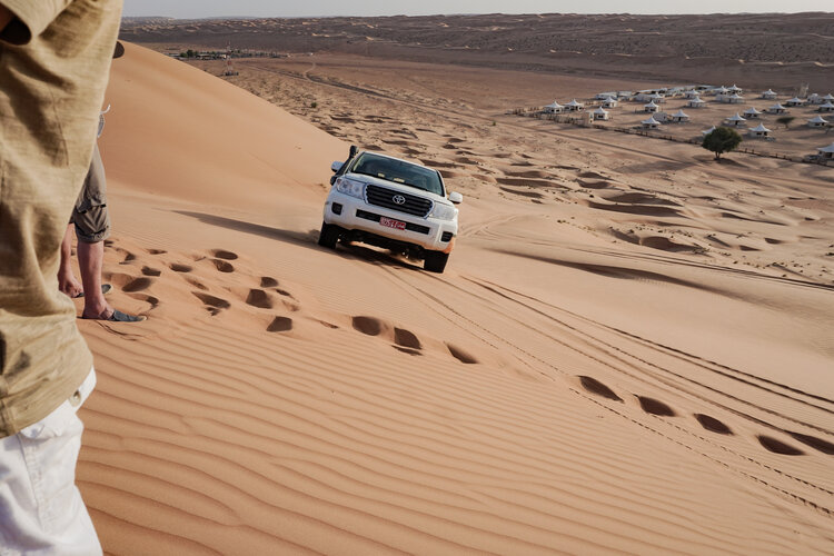 Toyota-Land-Cruiser-climbing-desert-dunes-Desert-Nights-Camp-Oman-Wahiba-Sharqiya-Sands.jpg