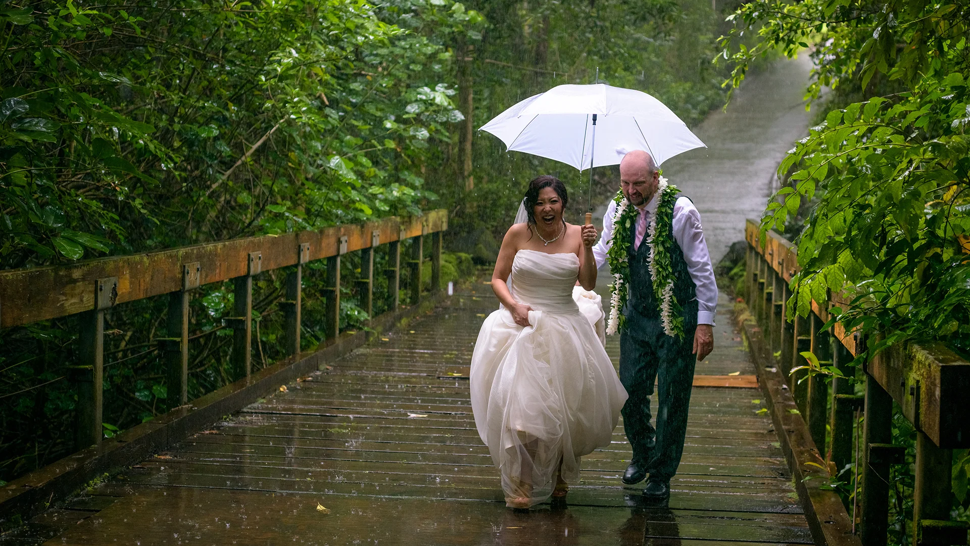 The rain didn’t spoil their fun during our couple’s session at the Koolau ballroom’s in Hawaii.