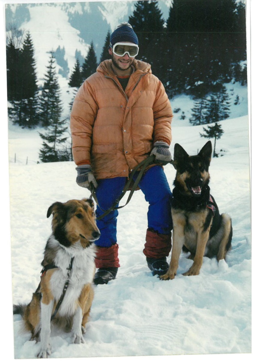 Young Vahagn with rescue dogs Yuron and Collie.