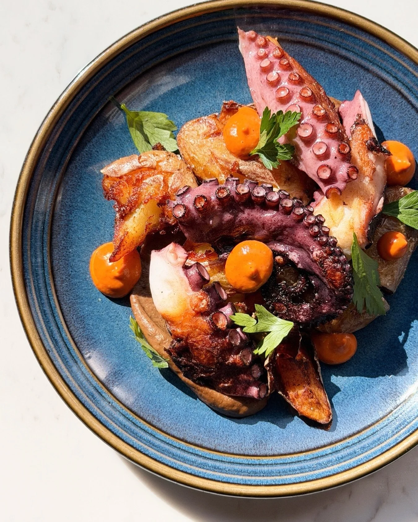 🌟 TONIGHT: another winner from Chef @plantainsupernova_ 👀

Pan Seared Octopus with eggplant black garlic puree, crispy fried fingerling potatoes, romesco sauce, and flat parsley. 🐙🥔🌱

Limited quantities. Get it before it&rsquo;s gone 🍽️

📍 @na