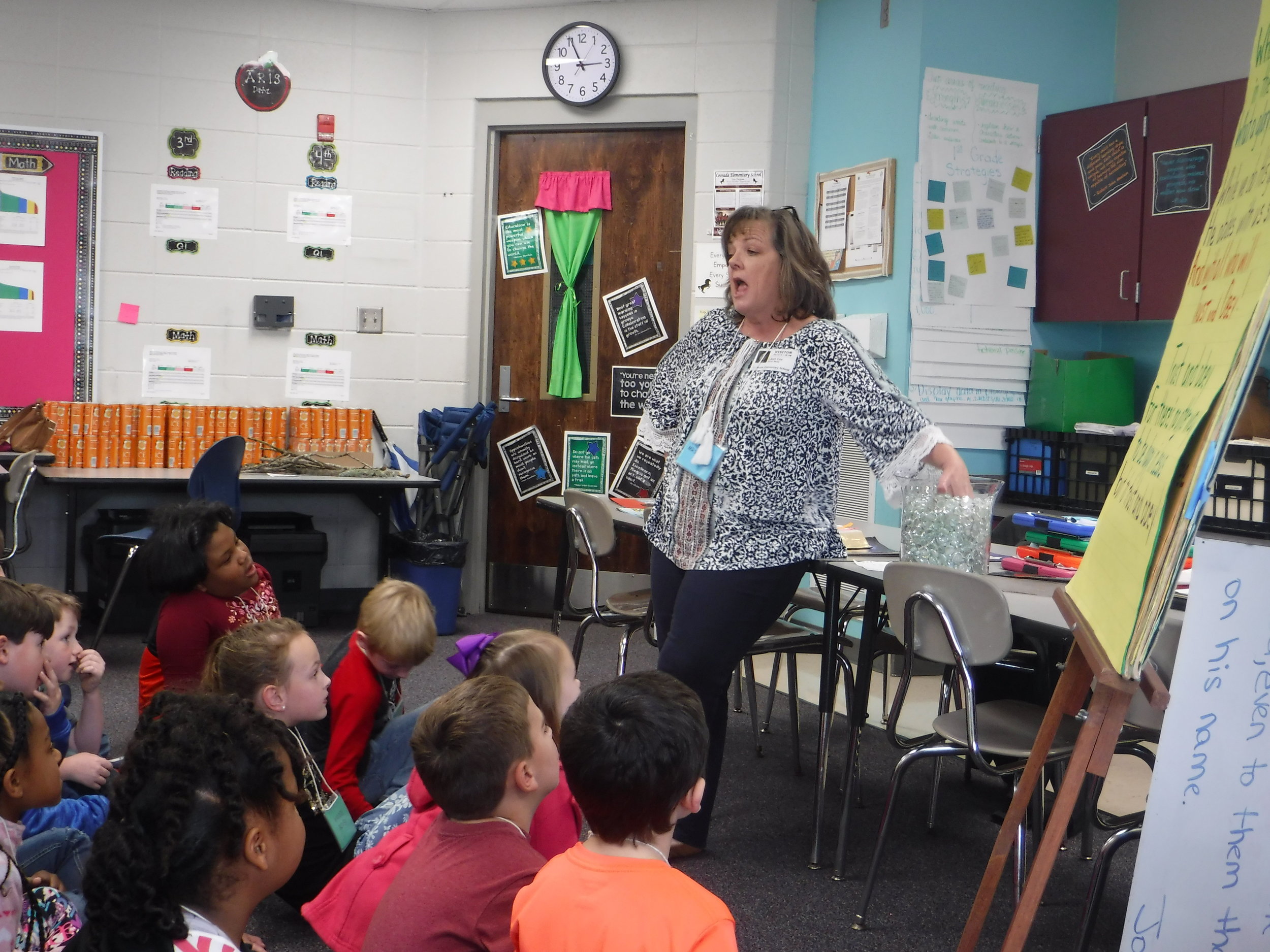  A volunteer teaches about God’s omniscience and sovereignty at the Coosada Elementary  Good News Club® . 