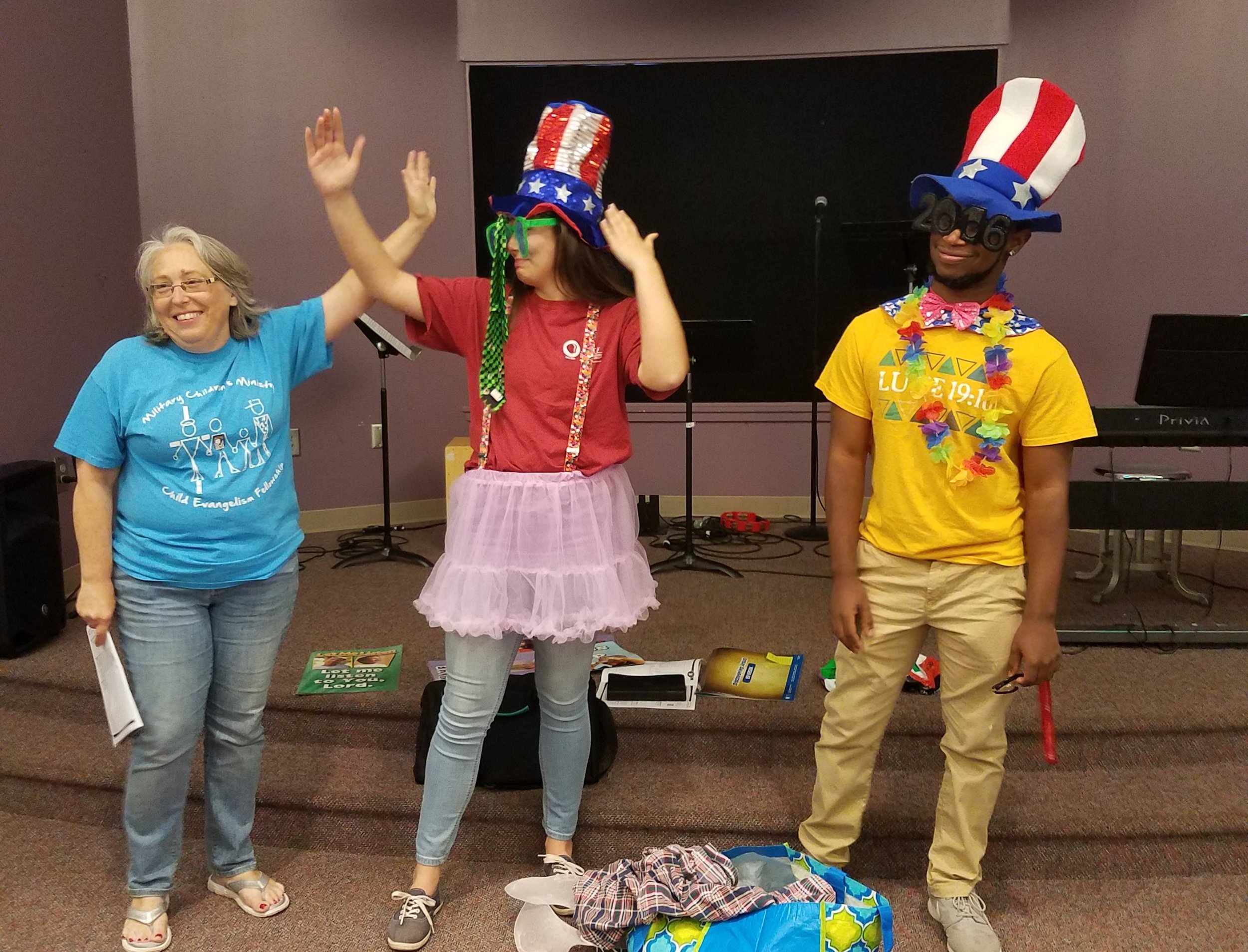  Teree Solomon, with Abby Solomon and Isaac Ritchie, lead a demonstration of  5-Day Club®  for a Summer Church Partner Training. 