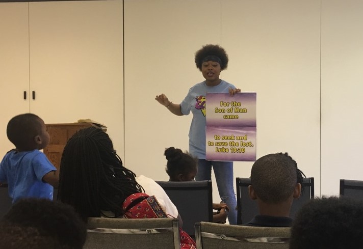  Mioshey Collins teaches memory verse a  5-Day Club®  partnering with Taylor Road Baptist Church in Montgomery, Alabama.  