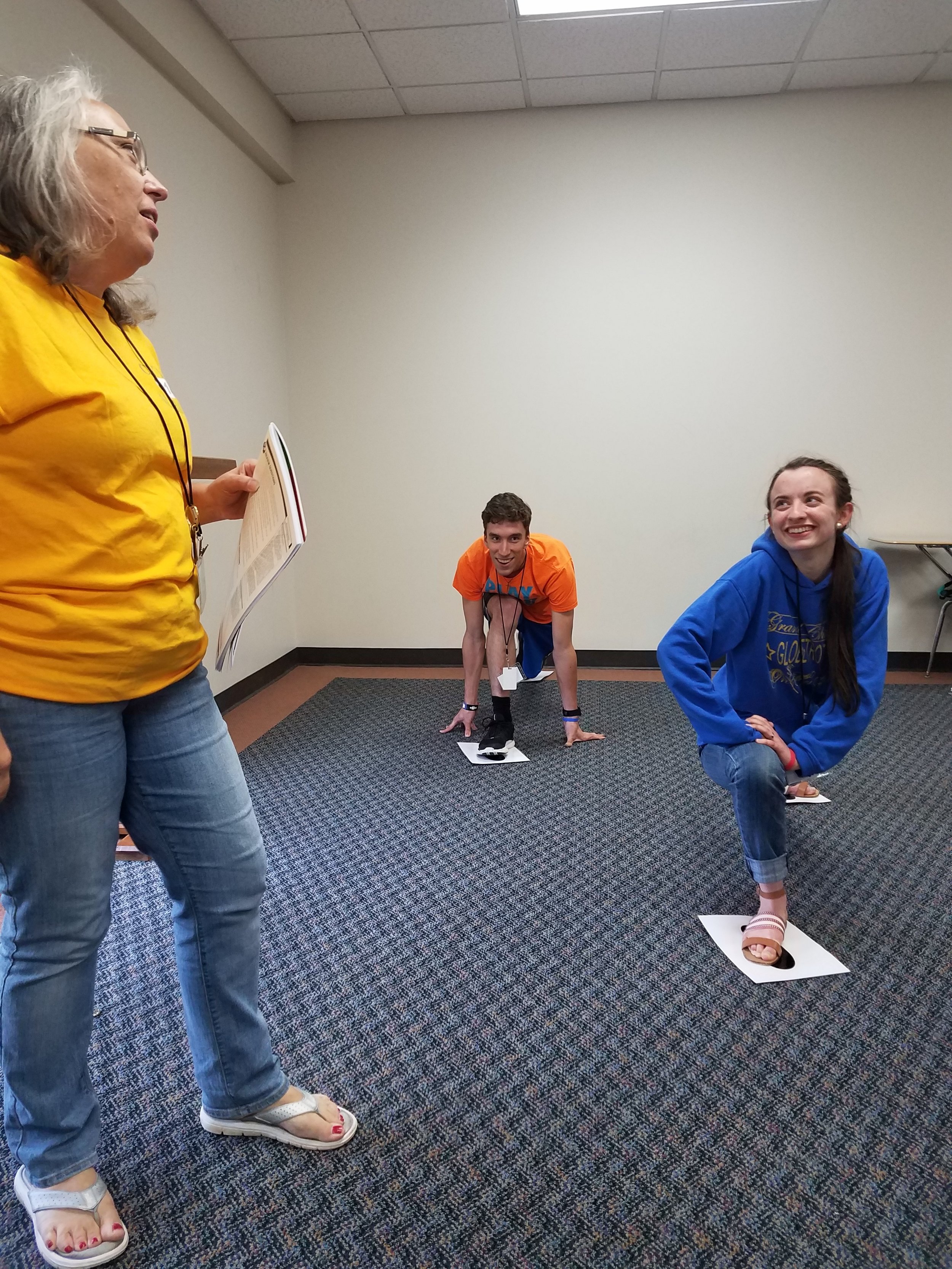Teree Solomon leads students at Christian Youth In Action® in learning review games to play with children in 5-Day Club®.
