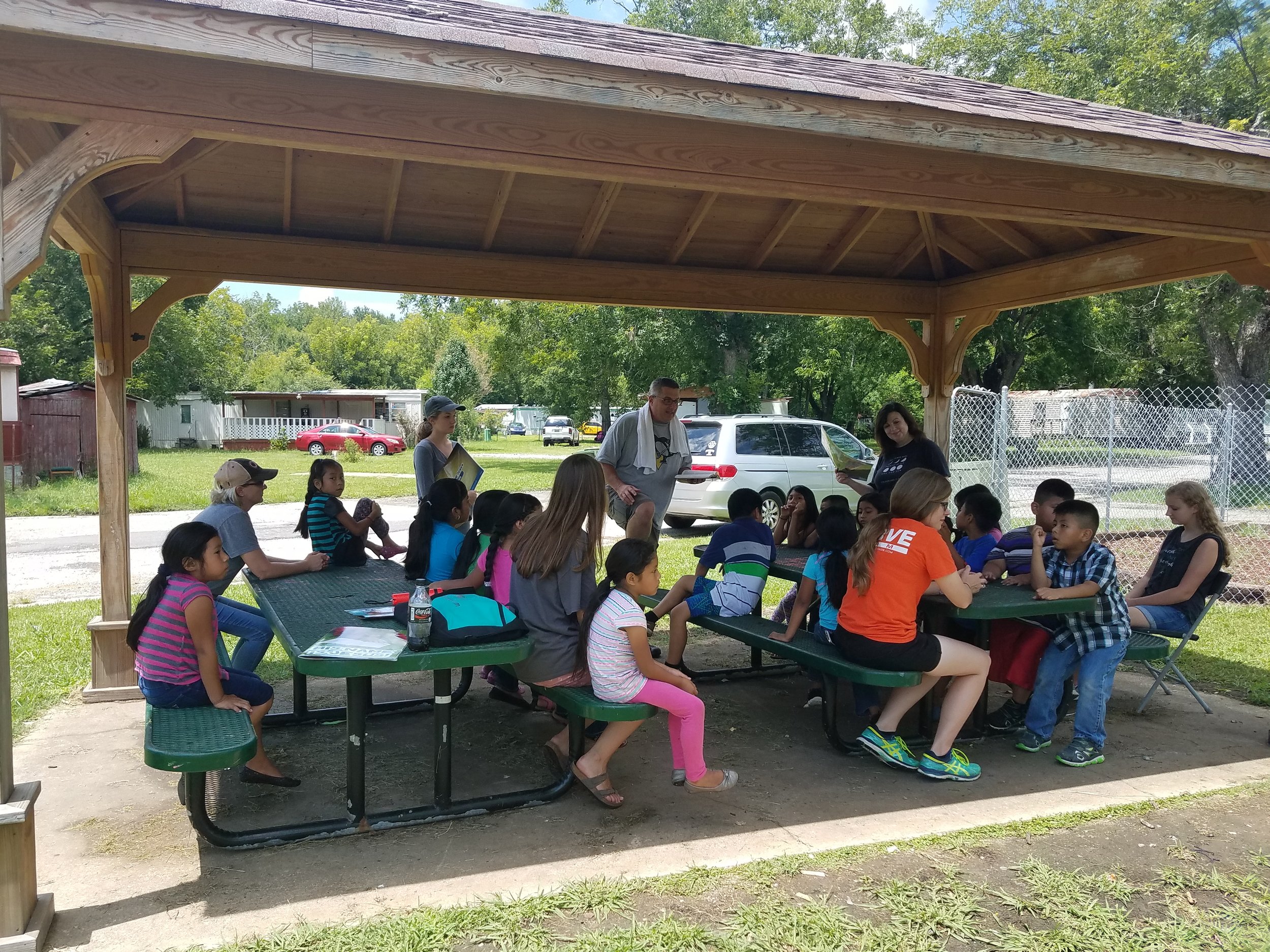 Children gather for 5-Day Club® at Regency Park as part of a partnership between Gateway Baptist Church and CEF® of Central Alabama.