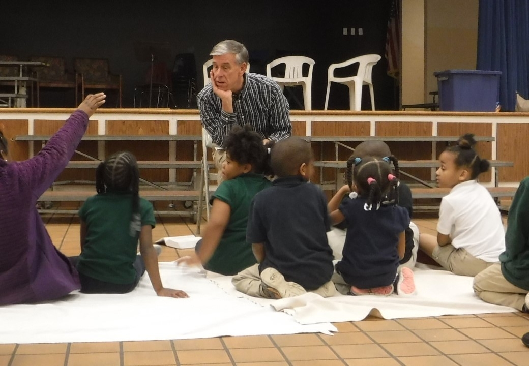  Bill Thompson, pastor of Grace Presbyterian Church, teaches a Bible lesson about the Holy Spirit at the Dozier Elementary  Good News Club® . 