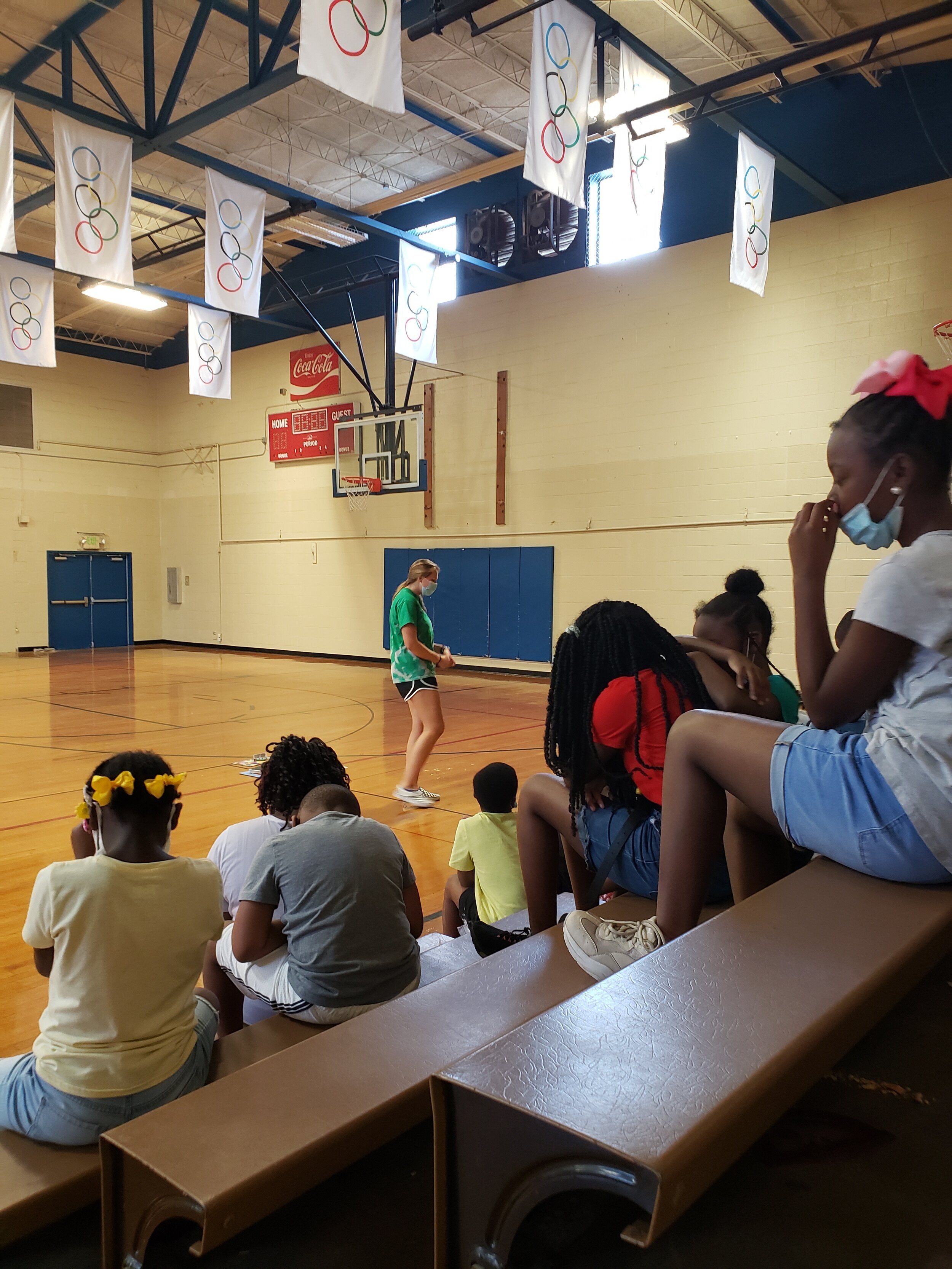  Kate Carver praying over the club at Cleveland YMCA July 2020. 