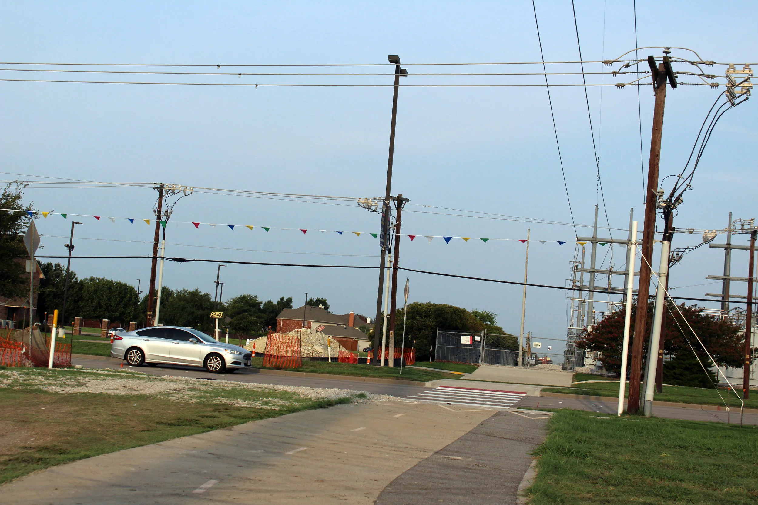 “Goal posts” are installed for large equipment operators to signal a low power line crossing.