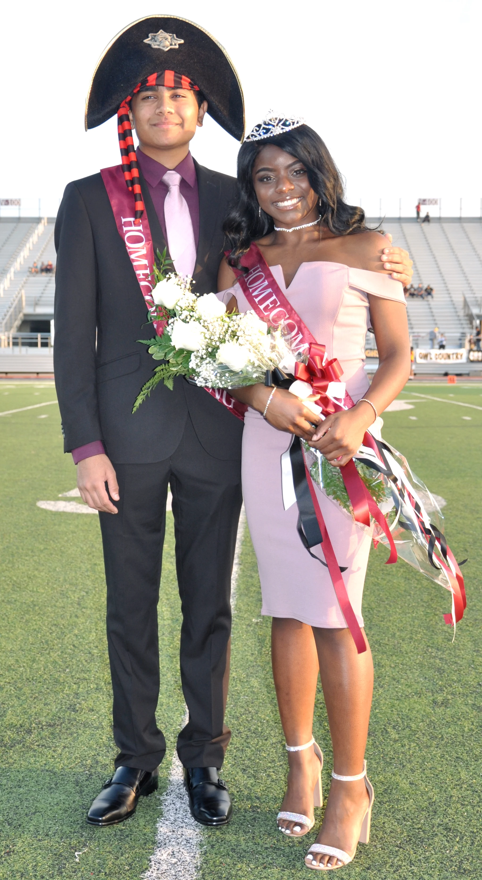 Neil Patel and Olivia Ofoegbu are crowned homecoming king and queen.