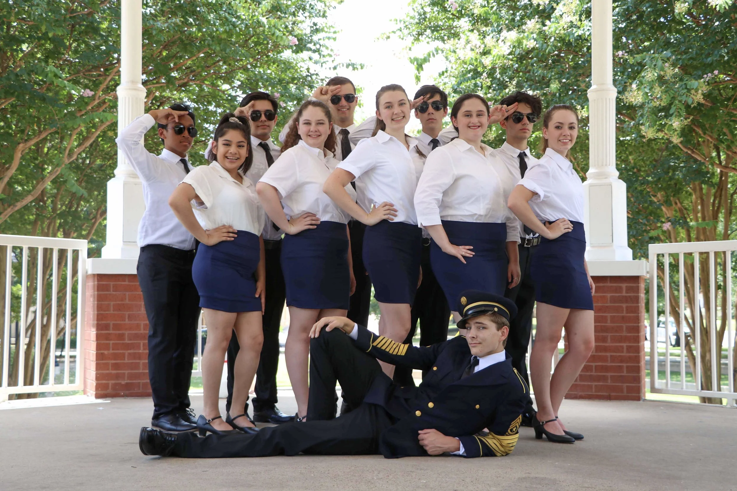 Pan Am pilots and stewardesses sing several songs such as “Jet Set”.