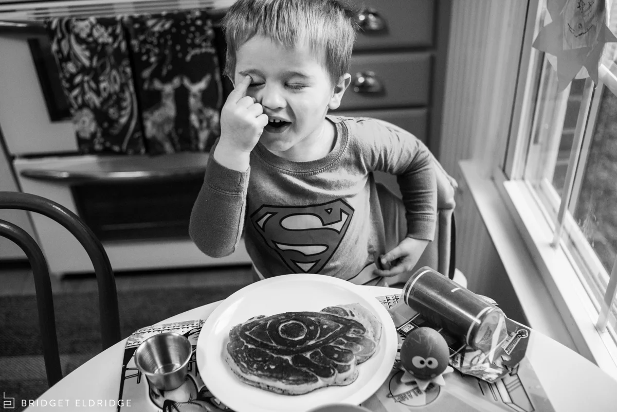 little boy loves his pancake shaped like an eye