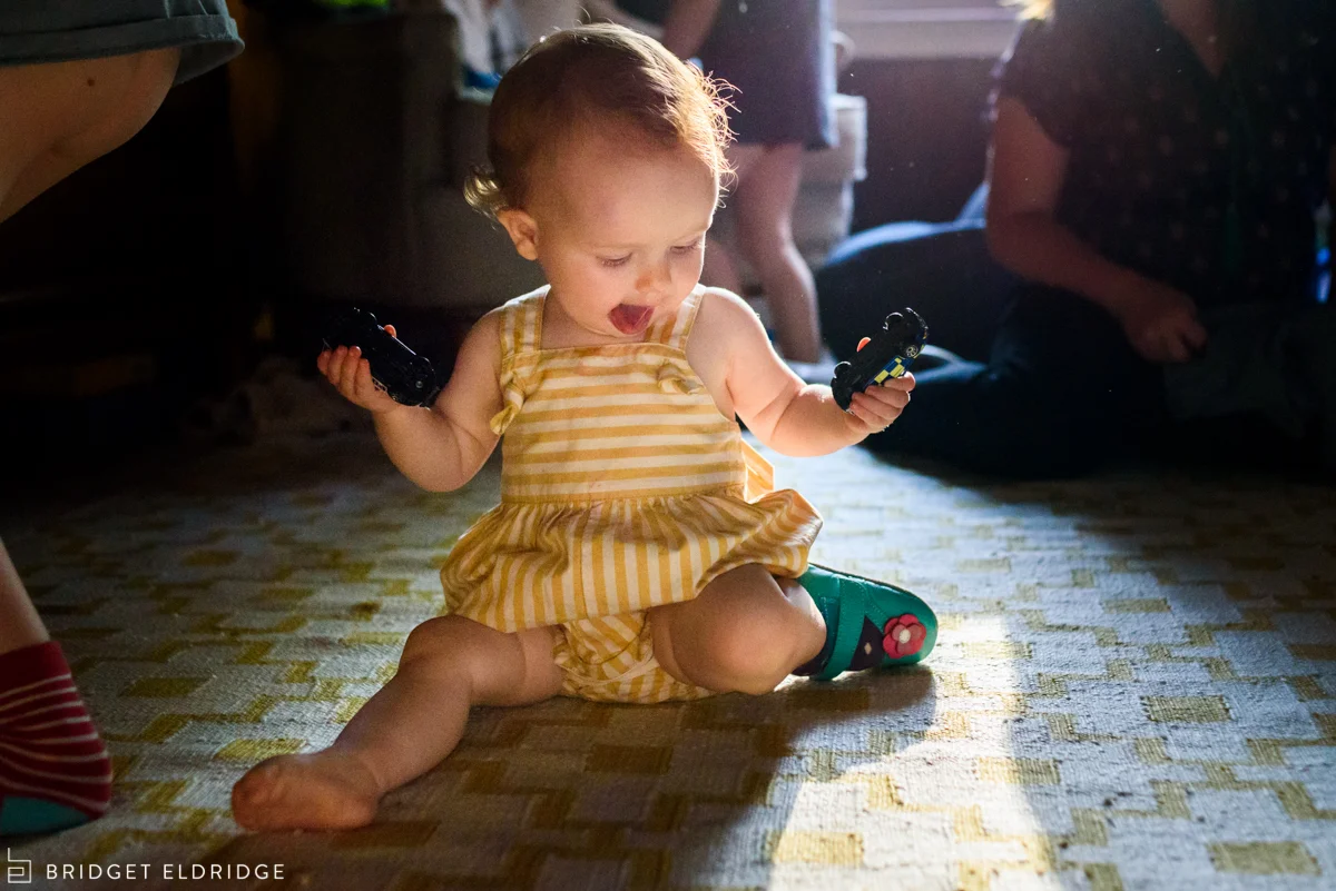 little girl plays in pretty light