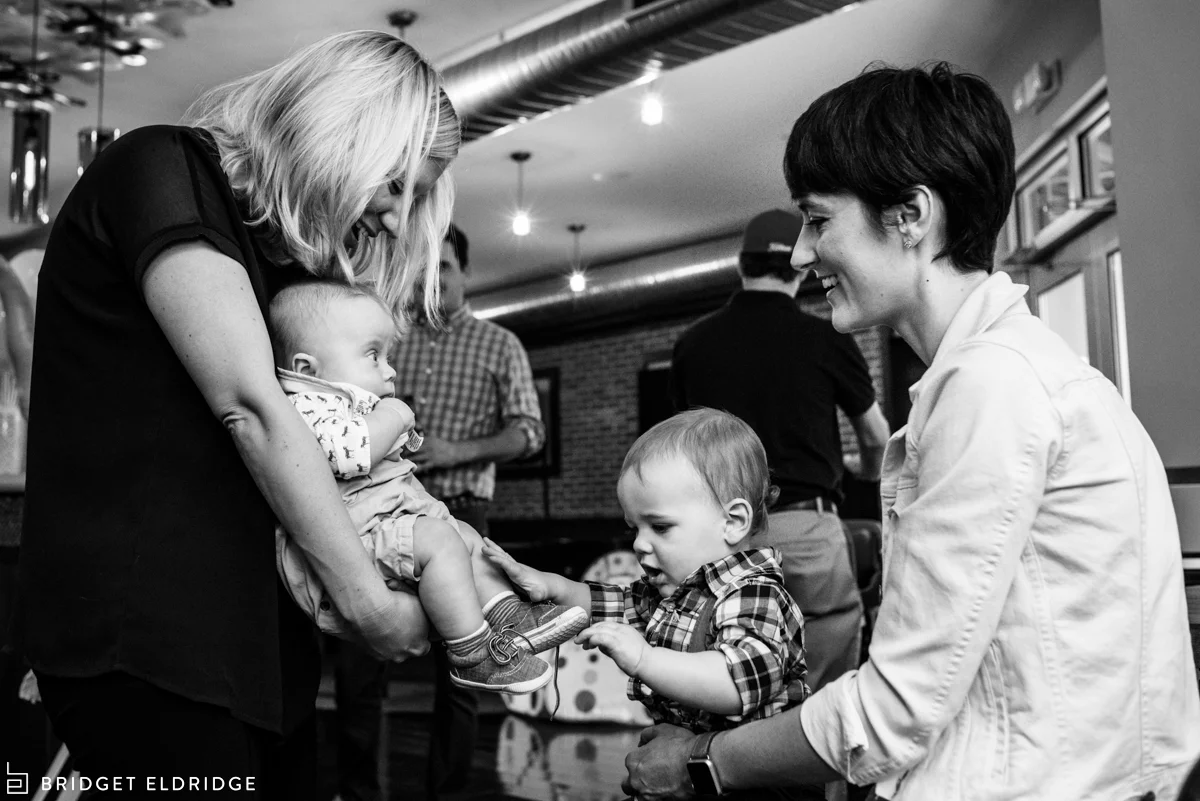 baby friends say hello at a 1st birthday party